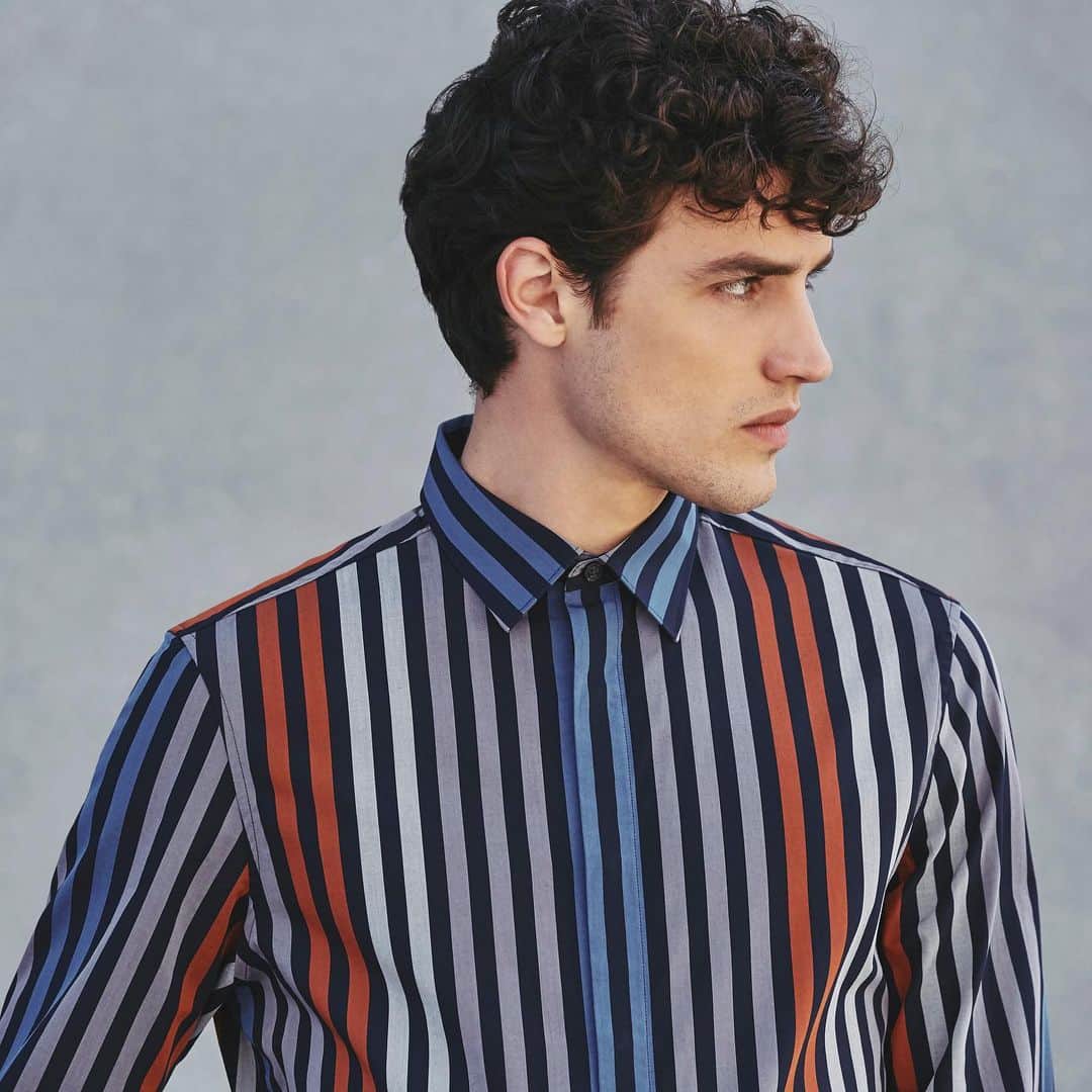 ペリーエリスのインスタグラム：「Our Multi-Color Vertical Stripe Shirt offers just the right mix of fun and formal to go straight from work to after-hours events without missing a beat. #PerryEllis #LifeReadySince1976」