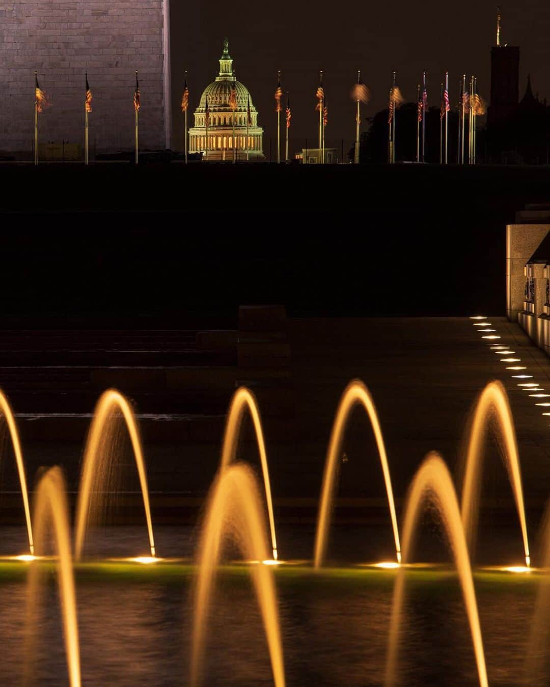 National Geographic Travelさんのインスタグラム写真 - (National Geographic TravelInstagram)「Photo by @BabakTafreshi | Swipe for this entire view of a calm summer night at the National Mall with fountains of World War II Memorial in the foreground and Washington Monument and Capitol Hill in the background. Explore more of The World at Night photography @babaktafreshi. #washingtondc」8月20日 1時02分 - natgeotravel