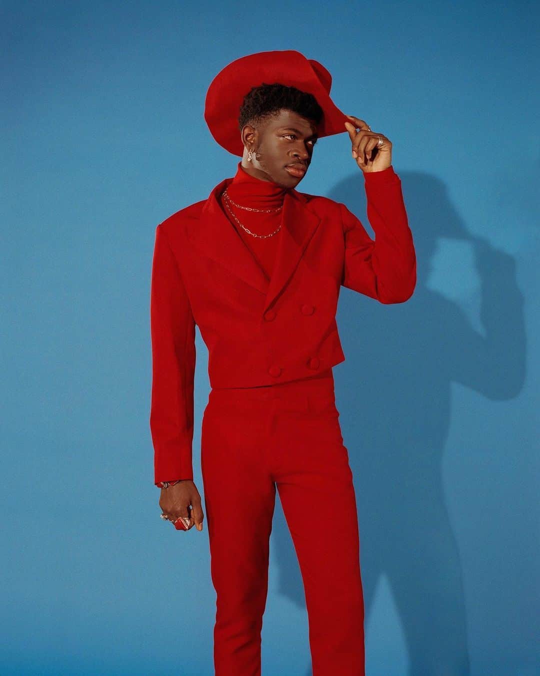 TIME Magazineさんのインスタグラム写真 - (TIME MagazineInstagram)「For a lot of reasons, @lilnasx didn’t initially plan to come out. He had been taught from a young age that homosexuality “is never going to be O.K.,” and he feared he would lose fans. While #hiphop stars like Frank Ocean (@blonded) and Tyler, the Creator (@feliciathegoat) have come out as #queer, the spectre of homophobia still looms large. But during #Pride Month, reports Andrew R. Chow, something changed for Lil Nas. “I never would have done that if I wasn’t in a way pushed by the universe,” he says. “In June, I’m seeing Pride flags everywhere and seeing couples holding hands—little stuff like that.” He first came out to his father and sister earlier in June, and then broke the news on Twitter several weeks later. It was a historic moment, in no small part because of how casually he went about it: “Thought I made it obvious,” he tweeted, pointing out a rainbow on his album cover. He had some haters, but they were quickly and summarily dismissed—often by him personally. Meanwhile, “Old Town Road” continued to rack up millions of streams, extending its run atop the Billboard Hot 100. Now Lil Nas’ playful expression of his sexuality is just another part of his self-deprecating online brand. “Last year i was sleeping on my sisters floor, had no money, struggling to get plays on my music, suffering from daily headaches, now i’m gay,” he tweeted at the end of July. Read more at the link in bio. Photograph by @kelianne for TIME」8月20日 2時05分 - time