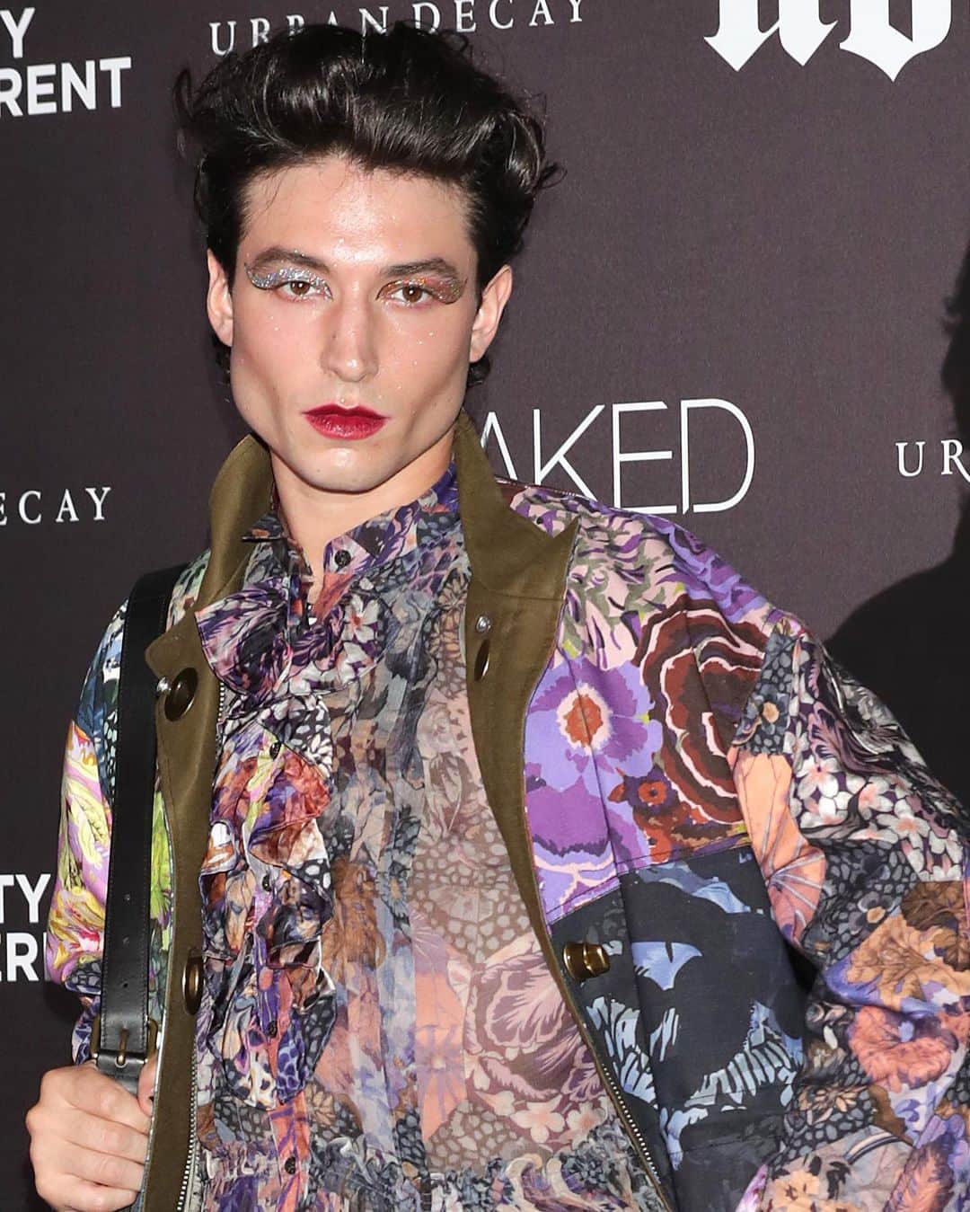 Just Jaredさんのインスタグラム写真 - (Just JaredInstagram)「Ezra Miller goes glam in a @coach mini-dress at the Pretty Different launch for @urbandecaycosmetics! See more on JustJared.com now. Photos: @gettyimages」8月21日 4時24分 - justjared