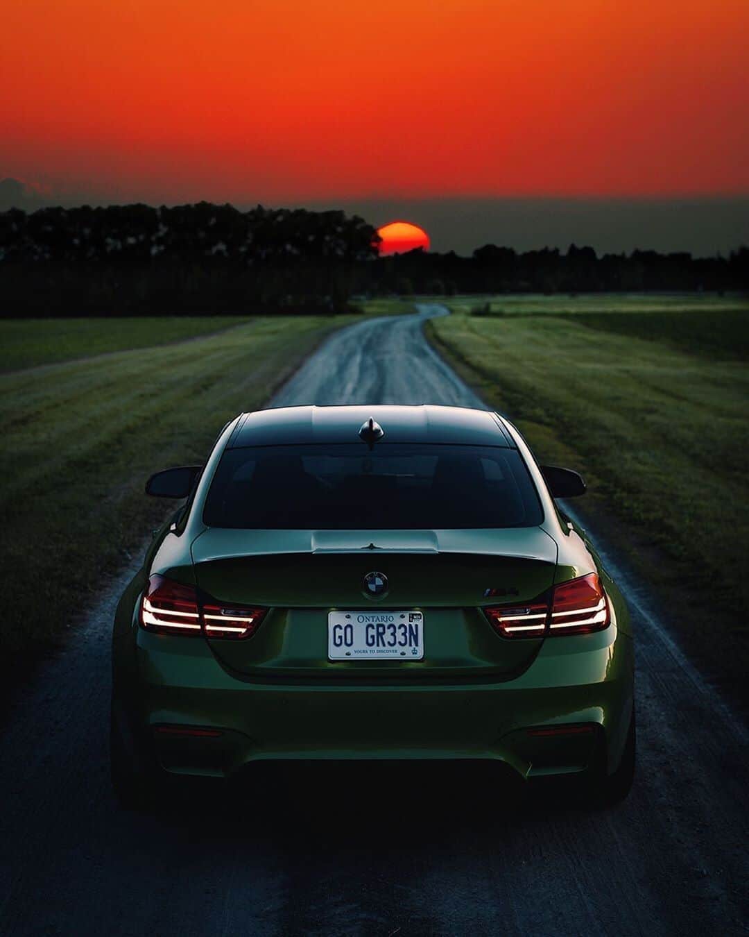 BMWのインスタグラム：「The ultimate destination is the end of the world.  The BMW M4 Coupé. #TheM4 #BMW #M4 #BMWM #BMWrepost @da.green.machine __ BMW M4 Coupé: Fuel consumption in l/100 km (combined): 10.0. CO2 emissions in g/km (combined): 227 [213]. Acceleration (0-100 km/h): 4.3 s. Power: 431 hp, 550 Nm. Top speed (limited): 250 km/h.  The values of fuel consumptions, CO2 emissions and energy consumptions shown were determined according to the European Regulation (EC) 715/2007 in the version applicable at the time of type approval. The figures refer to a vehicle with basic configuration in Germany and the range shown considers optional equipment and the different size of wheels and tires available on the selected model. The values of the vehicles are already based on the new WLTP regulation and are translated back into NEDC-equivalent values in order to ensure the comparison between the vehicles. [With respect to these vehicles, for vehicle related taxes or other duties based (at least inter alia) on CO2-emissions the CO2 values may differ to the values stated here.] The CO2 efficiency specifications are determined according to Directive 1999/94/EC and the European Regulation in its current version applicable. The values shown are based on the fuel consumption, CO2 values and energy consumptions according to the NEDC cycle for the classification. Further information on official fuel consumption figures and specific CO2 emission values of new passenger cars is included in the following guideline: 'Leitfaden über den Kraftstoffverbrauch, die CO2-Emissionen und den Stromverbrauch neuer Personenkraftwagen' (Guide to the fuel economy, CO2 emissions and electric power consumption of new passenger cars), which can be obtained free of charge from all dealerships, from Deutsche Automobil Treuhand GmbH (DAT), Hellmuth-Hirth-Str. 1, 73760 Ostfildern-Scharnhausen and at https://www.dat.de/co2/.」