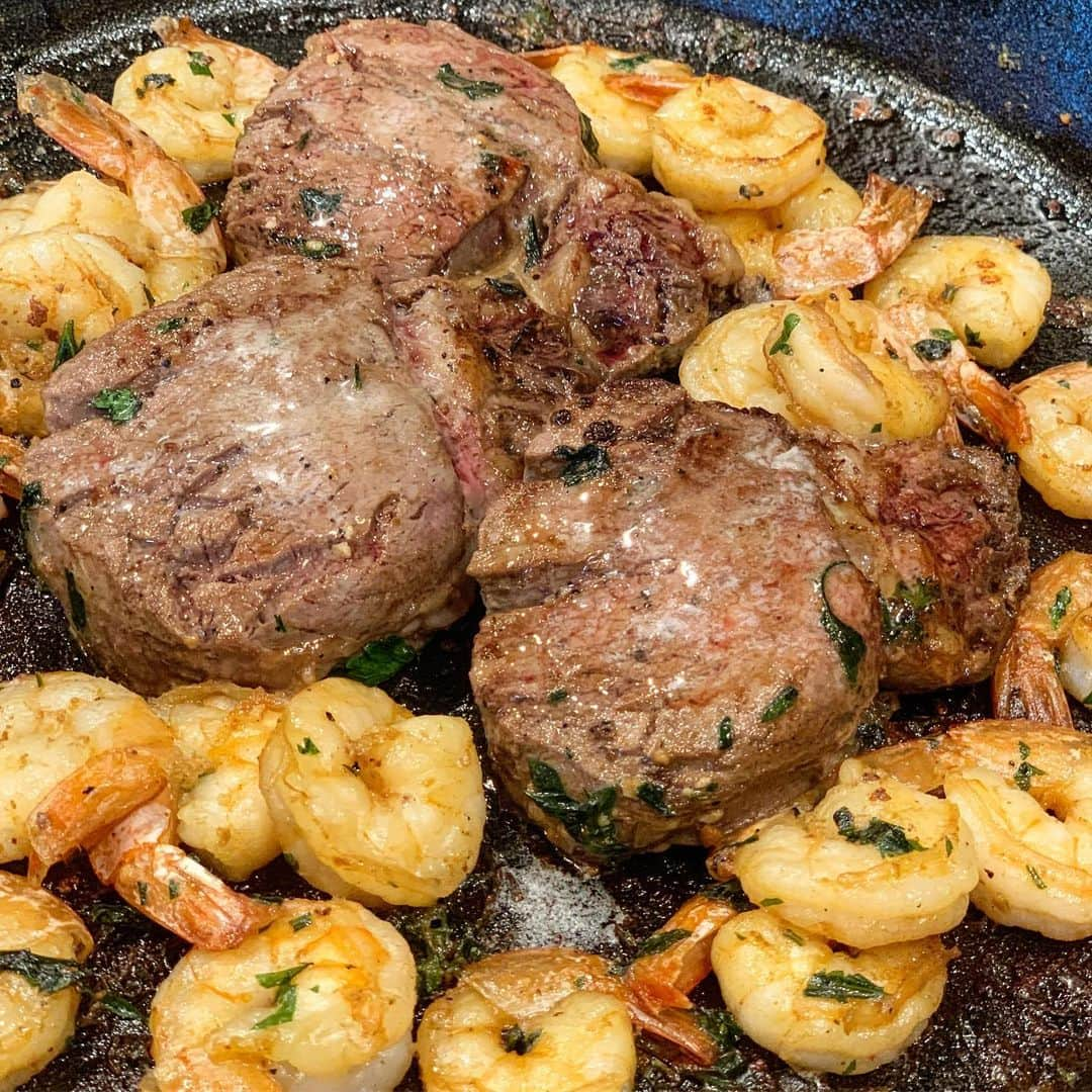 Flavorgod Seasoningsさんのインスタグラム写真 - (Flavorgod SeasoningsInstagram)「Cast Iron Steak and Sautéed Garlic Shimp 🥩🍤🍤 - Recipe by: @ketogrid Seasoning: #flavorgod Garlic Lovers🧄 and Himalayan Salt & Peppercorn🧂 - KETO Seasonings on Sale here ⬇️ Click the link in the bio -> @flavorgod - Ingredients: 3 1/2 pound Grass fed steaks @flavorgod Himalayan Salt & Peppercorn @flavorgod Garlic Lovers 1 1/4 lbs extra large shrimp, peeled and deveined⁣, tails on or off⁠ 1/4 cup butter⁣ 1 Tbsp minced garlic (3 cloves)⁣ 2 Tbsp minced fresh parsley - Directions: Preheat heat cast Iron skillet over medium heat, add 1/4 cup butter⁣ and 1 Tbsp minced garlic (3 cloves)⁣ and sautée. Season steaks with @flavorgod Himalayan Salt & Peppercorn. Place steaks in middle of pan and sear for 5-7 minutes on each side(Depending on steak thickness and pan temp). I added an extra 1/4 of butter and a little extra garlic to the pan then added the shrimp. Add @flavorgod Garlic Lovers Seasonings along with 2 Tbsp minced fresh parsley. The shrimp cooks really fast in the cast iron skillet, flip halfway through cooking. Spread butter all over of steaks, and place entire skillet in oven on broil for 3-5 minutes until the steak and shrimp are golden brown. Transfer steaks to a warm plate and let rest for 5 minutes. While steaks are resting, melt remaining butter. - Shrimp Nutrition Facts:⁣ (Amount Per Serving: 4)⁣ Calories 248⁣ Fat: 13g⁣ Protein: 29g⁣ Carbohydrates: 1g⁣ - Enjoy! - #food #foodie #flavorgod #seasonings#glutenfree #mealprep #keto #paleo #kosher #breakfast #lunch#dinner #yummy #delicious #foodporn」8月21日 10時44分 - flavorgod