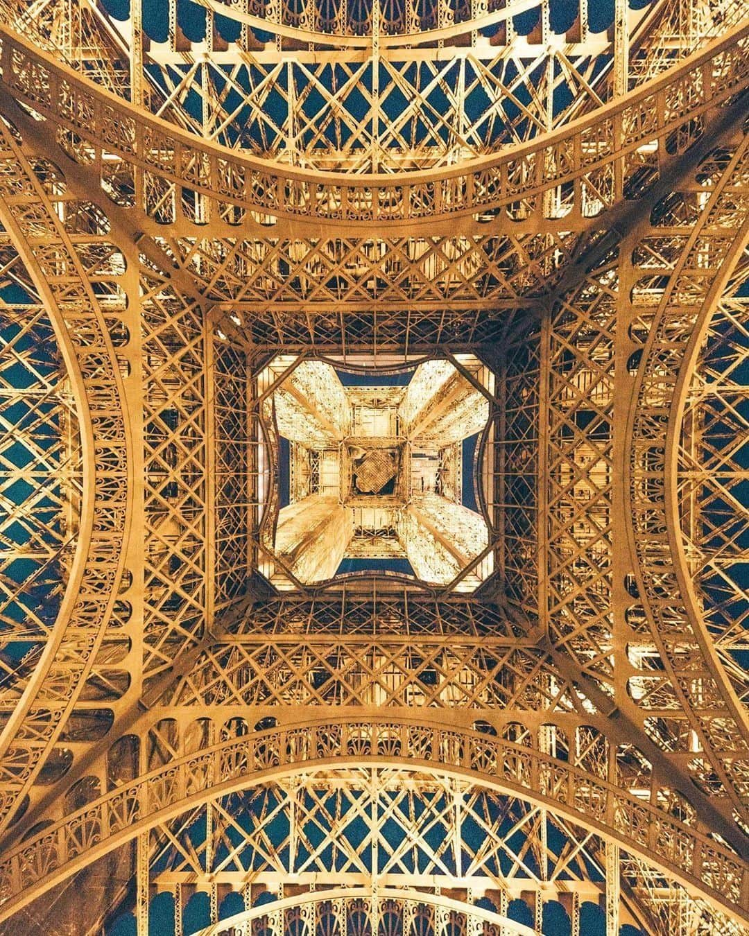 Canon Asiaのインスタグラム：「“When it comes to photographing architecture, or popular locations, I always take the approach of creating something that has a unique perspective and direct reflection of how I see things through my eyes.  Although the Eiffel Tower has been photographed countless times, this ground-up perspective was one that really showcased the beauty, in shape and structure, behind one of the world’s most recognisable and well-known landmarks.” . 📷 Image by @henryhwu shot using the Canon 5D Mark IV | f/3.5 | 1/80s | ISO 5000| 14mm  Want your photos to be featured too? Tag them with #canonasia or submit them on My Canon Story, link in bio!  #canonasia #photography #paris #eiffeltower #architecture #france #architecturephotography #lowangle」