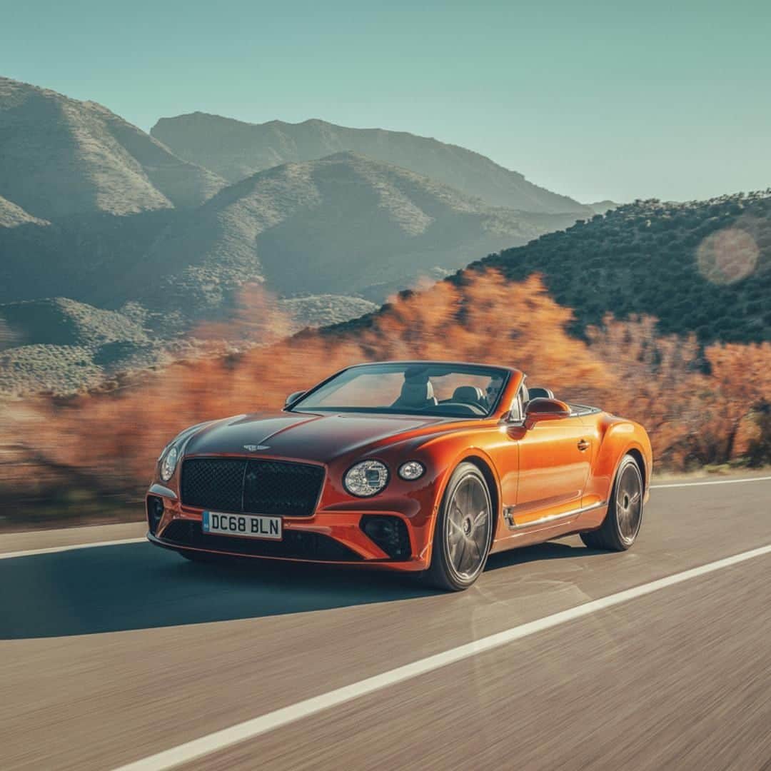 ベントレーさんのインスタグラム写真 - (ベントレーInstagram)「Created to be driven on the world's most beautiful roads. The new #Bentley #ContinentalGTC in Orange Flame. Configure yours through the link in bio. _ Continental GT Convertible WLTP drive cycle: combined fuel consumption: 14.8 mpg (19.1 l/100 km), combined CO2: 336 g/km」8月22日 4時00分 - bentleymotors
