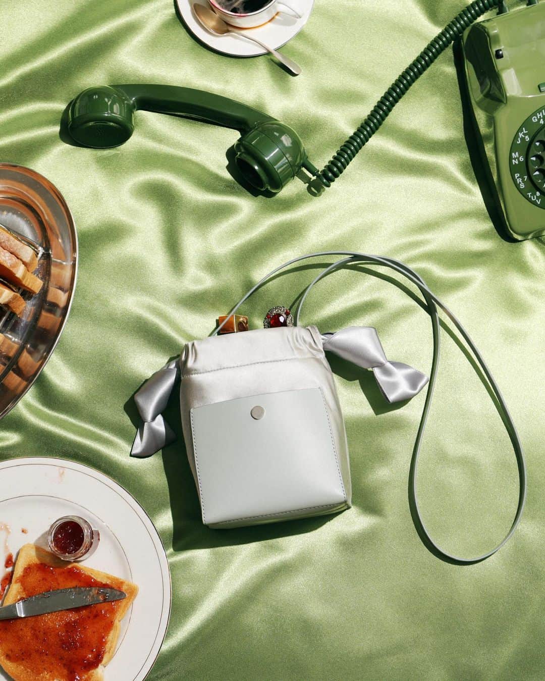 Sophie Hulmeのインスタグラム：「Hanging on the telephone 💚 The Satin Knot, shot by @mattfordstudio.」