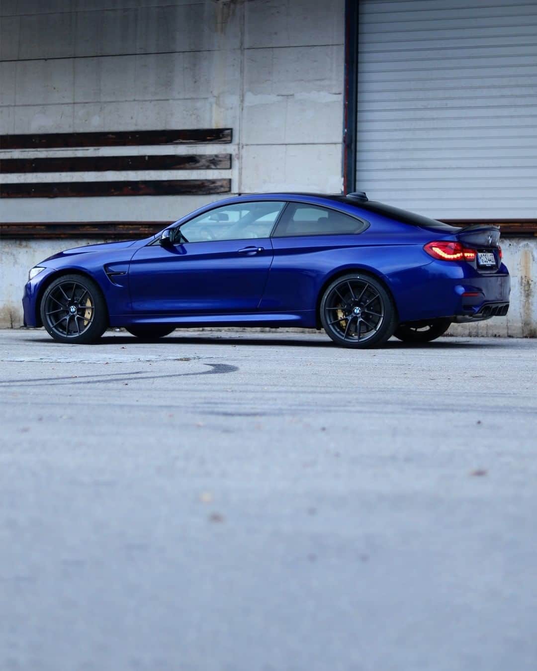BMWのインスタグラム：「Plays the game of the roads at advanced level. The BMW M4 CS. #TheM4 #BMW #M4 #BMWM #BMWrepost @goeckii @cars.munich  __ BMW M4 CS: Fuel consumption in l/100 km (combined): 8.4. CO2 emissions in g/km (combined): 197.  Acceleration (0-100 km/h): 3.9 s. Power: 460 hp, 600 Nm. Top speed (limited): 250 km/h. Paint finish shown: San Marino Blue metallic.  The values of fuel consumptions, CO2 emissions and energy consumptions shown were determined according to the European Regulation (EC) 715/2007 in the version applicable at the time of type approval. The figures refer to a vehicle with basic configuration in Germany and the range shown considers optional equipment and the different size of wheels and tires available on the selected model. The values of the vehicles are already based on the new WLTP regulation and are translated back into NEDC-equivalent values in order to ensure the comparison between the vehicles. [With respect to these vehicles, for vehicle related taxes or other duties based (at least inter alia) on CO2-emissions the CO2 values may differ to the values stated here.] The CO2 efficiency specifications are determined according to Directive 1999/94/EC and the European Regulation in its current version applicable. The values shown are based on the fuel consumption, CO2 values and energy consumptions according to the NEDC cycle for the classification. Further information on official fuel consumption figures and specific CO2 emission values of new passenger cars is included in the following guideline: 'Leitfaden über den Kraftstoffverbrauch, die CO2-Emissionen und den Stromverbrauch neuer Personenkraftwagen' (Guide to the fuel economy, CO2 emissions and electric power consumption of new passenger cars), which can be obtained free of charge from all dealerships, from Deutsche Automobil Treuhand GmbH (DAT), Hellmuth-Hirth-Str. 1, 73760 Ostfildern-Scharnhausen and at https://www.dat.de/co2/.」