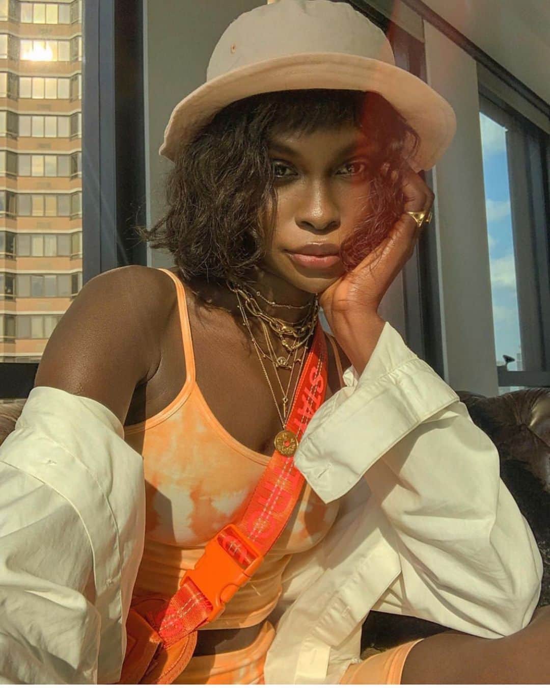 ジョージジーナ&ルーシーのインスタグラム：「Goddess @lefevrediary spiced up her outfit with our „Pu$h Her“ bag in colorway: Pumpkin Strong 🧡🧡🧡 • • • • • • #georgeginalucy #gglsquad #bag #tacticalbag #portrait #portraiture #ootd #potd #natural #naturalmakeup #beauty #face #jewelry #jewellery #newyork #nyc #justhoshoot #streetwear #hypebeast #hypebae #35mm #vsco」
