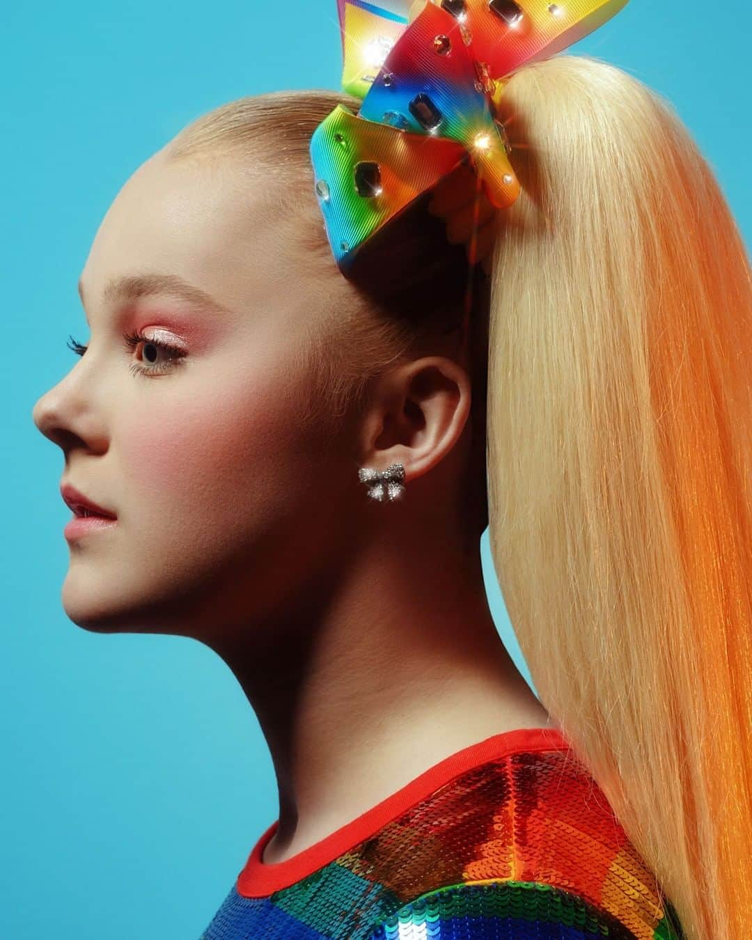 TIME Magazineさんのインスタグラム写真 - (TIME MagazineInstagram)「@itsjojosiwa, 16, has spaghetti blond hair and a voice like a wooden roller-coaster track—fun, but rough, with unexpected undulations. She began her rise to fame around 2015 as a hammy preteen with a machinating mom on the Lifetime reality TV series @dancemomstv. Since then, a talent deal with @nickelodeon has crowned her as #America’s most famous children’s entertainer—a singular star with more spunk than Shirley Temple and the merchandizing power of both Olsen twins. Arguably, writes @jamielaurenkeiles, Siwa’s main career is as a singer, though what sets her apart from the child stars before is the relative equanimity of her pursuits, and the way they’ve been stitched together to perpetuate one another, using her online presence as a thread. On YouTube, Siwa has 10 million subscribers, mostly grade-school kids and preteen girls who listen to her #music, consume her lifestyle content and beg for the hundreds—thousands?—of products that are featured throughout both. While other child stars were not girl, not yet woman, Siwa made it clear: She was both girl and brand. Read more at the link in bio. Photograph by Charlotte Rutherford (@charlie__chops) for TIME」8月25日 0時49分 - time