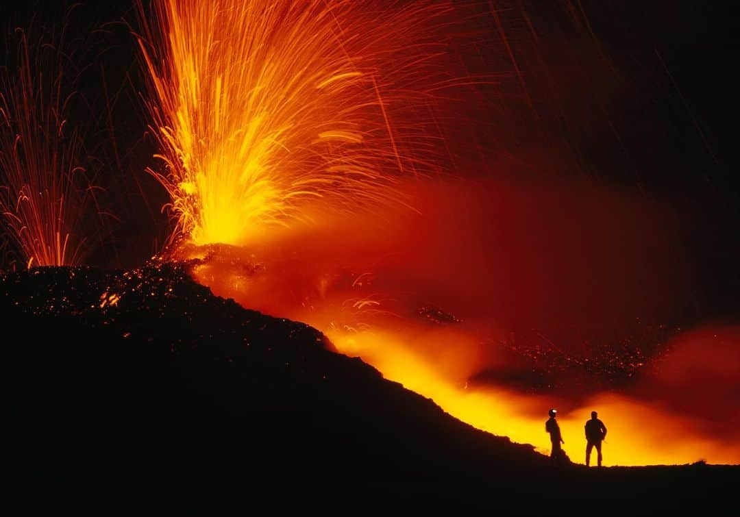 National Geographic Creativeさんのインスタグラム写真 - (National Geographic CreativeInstagram)「Photo by @carstenpeter | Scientists closely observe sparks and lava flowing from Mount Etna, Italy. #MountEtna #Italy #Volcano」8月25日 7時38分 - natgeointhefield