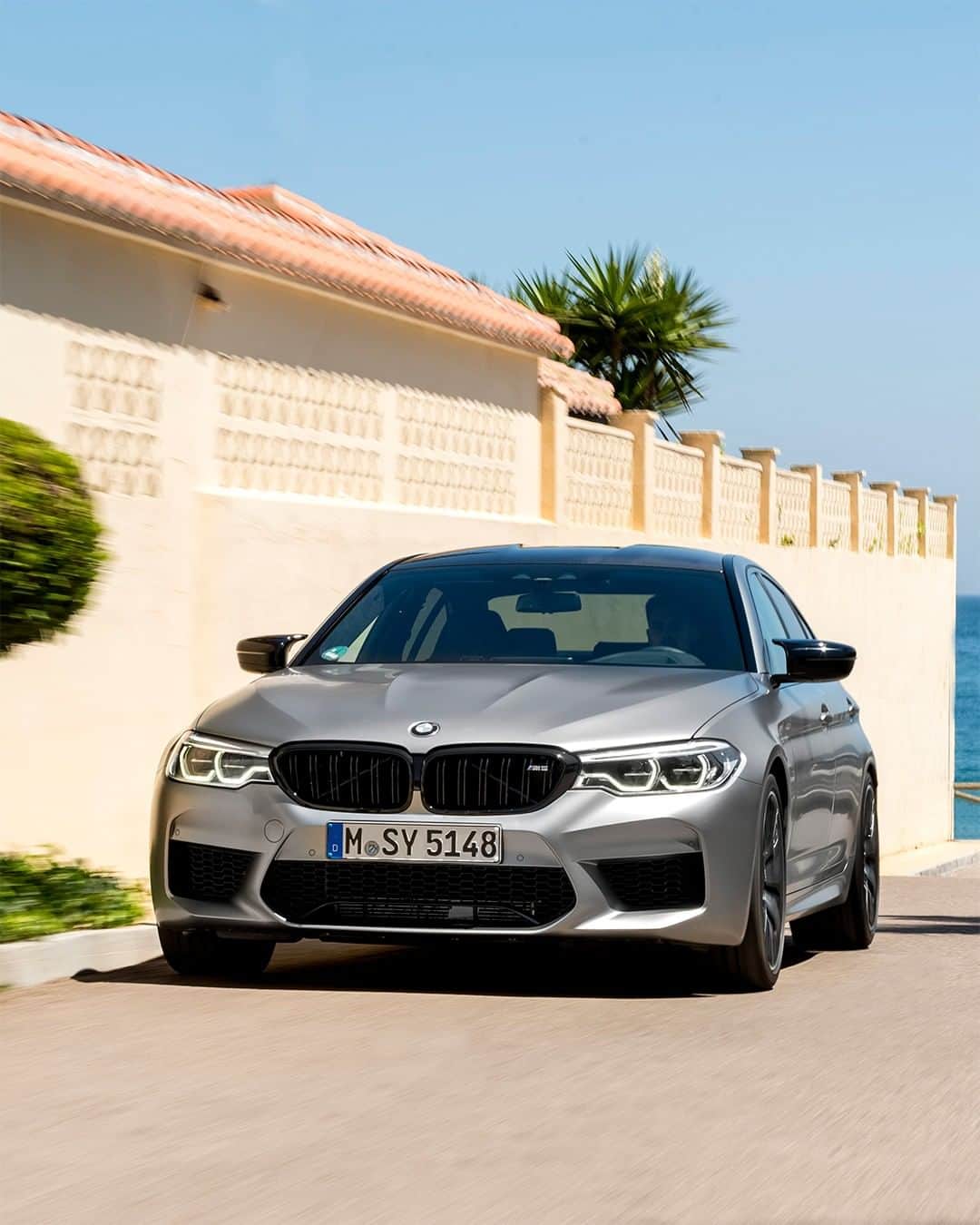 BMWのインスタグラム：「Top level attitude regardless of the season.  The BMW M5 Competition. #TheM5 #BMW #M5 #BMWM __ BMW M5 Competition: Fuel consumption in l/100 km (combined): 10.6. CO2 emissions in g/km (combined): 241.  Acceleration (0-100 km/h): 3.3 s. Power: 460 kW, 625 hp, 750 Nm. Top speed (limited): 250 km/h (with optional M Drivers Package: 305 km/h). The values of fuel consumptions, CO2 emissions and energy consumptions shown were determined according to the European Regulation (EC) 715/2007 in the version applicable at the time of type approval. The figures refer to a vehicle with basic configuration in Germany and the range shown considers optional equipment and the different size of wheels and tires available on the selected model. The values of the vehicles are already based on the new WLTP regulation and are translated back into NEDC-equivalent values in order to ensure the comparison between the vehicles. [With respect to these vehicles, for vehicle related taxes or other duties based (at least inter alia) on CO2-emissions the CO2 values may differ to the values stated here.] The CO2 efficiency specifications are determined according to Directive 1999/94/EC and the European Regulation in its current version applicable. The values shown are based on the fuel consumption, CO2 values and energy consumptions according to the NEDC cycle for the classification. Further information on official fuel consumption figures and specific CO2 emission values of new passenger cars is included in the following guideline: 'Leitfaden über den Kraftstoffverbrauch, die CO2-Emissionen und den Stromverbrauch neuer Personenkraftwagen' (Guide to the fuel economy, CO2 emissions and electric power consumption of new passenger cars), which can be obtained free of charge from all dealerships, from Deutsche Automobil Treuhand GmbH (DAT), Hellmuth-Hirth-Str. 1, 73760 Ostfildern-Scharnhausen and at https://www.dat.de/co2/.」