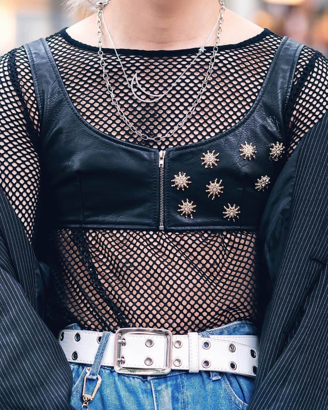 Harajuku Japanさんのインスタグラム写真 - (Harajuku JapanInstagram)「19-year-old Japanese fashion student Zaki (@17_pwo) on the street in Harajuku. He’s wearing handmade cutout jeans with rainbow belts, a studded leather crop top over a fishnet top, Kawi Jamele accessories, and Bershka boots.」8月27日 0時59分 - tokyofashion