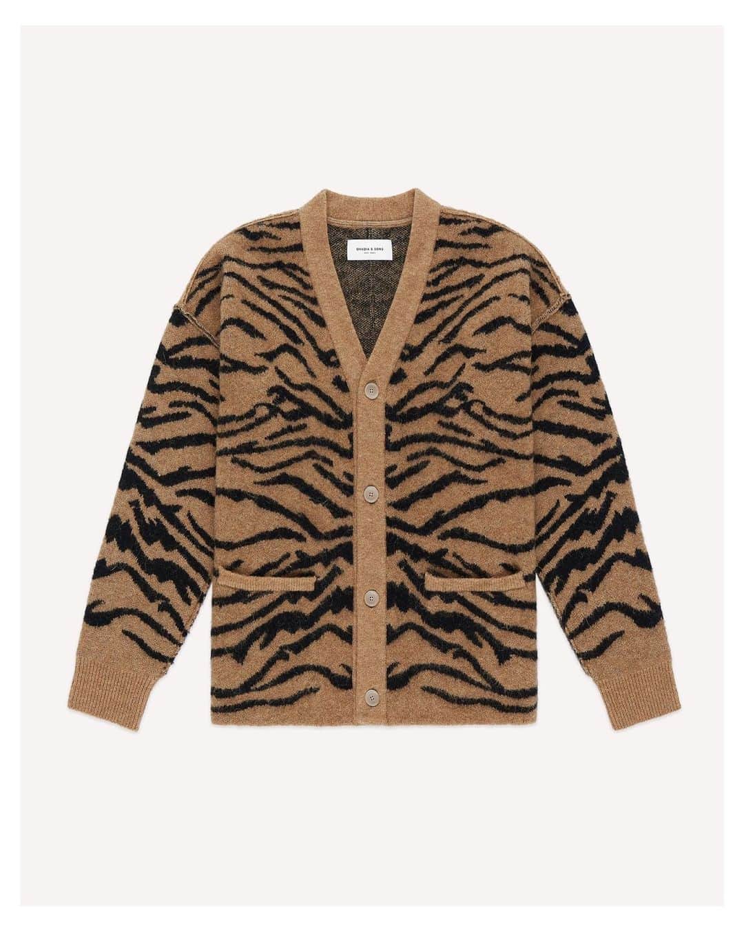 オバディア&サンズのインスタグラム：「🐅 Just like no two tigers have the same stripes, each person has a unique light to share with the world. The oversized mohair tiger cardigan is now available on ovadiaandsons.com」