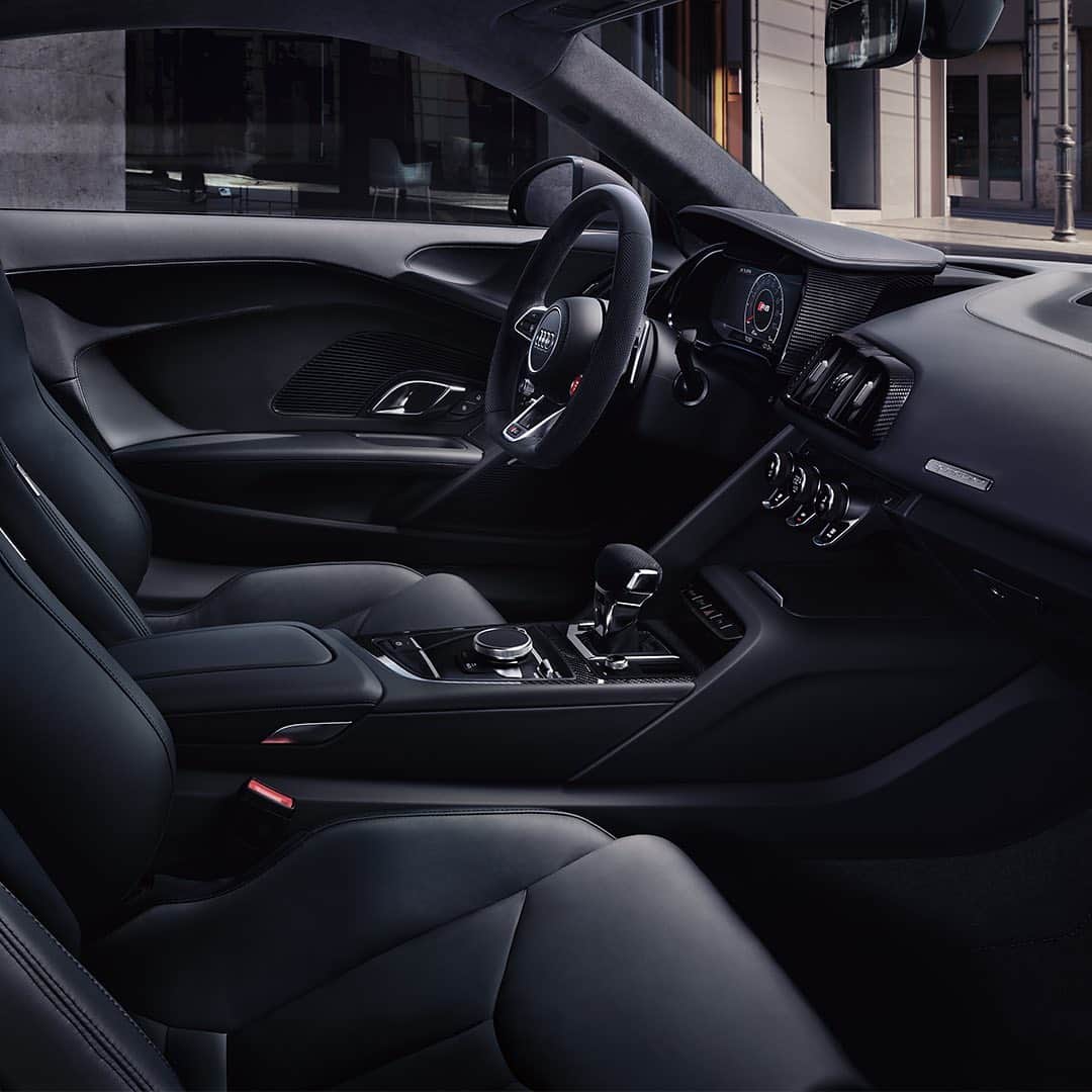 アウディ ジャパンさんのインスタグラム写真 - (アウディ ジャパンInstagram)「世界のレースシーンを席巻するレーシングマシンAudi R8 LMSと約50％のパーツを共有するロードゴーイングレーサー、Audi R8 Coupé。そして5.2ℓ V10 FSIエンジンのサウンドをオープンエアで楽しめる唯一無二の存在、Audi R8 Spyder。2019年11月、この2台が日本に上陸します。  ともにAudi史上最強の620 PS（456kW）のエンジン出力、331 km/hの最高速度、0-100km/h加速3.1秒という圧倒的なパフォーマンスを備えながらも、先進の装備やインフォテインメントシステムを搭載。  モータースポーツの最前線で鍛えられたV10エンジンと、見る者を虜にする美しい軌跡を描くエクステリアデザインを兼ね備えたスーパーカーです。  #AudiR8 #Audi #R8 #Coupé #アウディR8 #Audijapan #アウディ #Audiworld #Audigramm #audigenic #carporn #carwithoutlimits」8月27日 21時30分 - audijapan