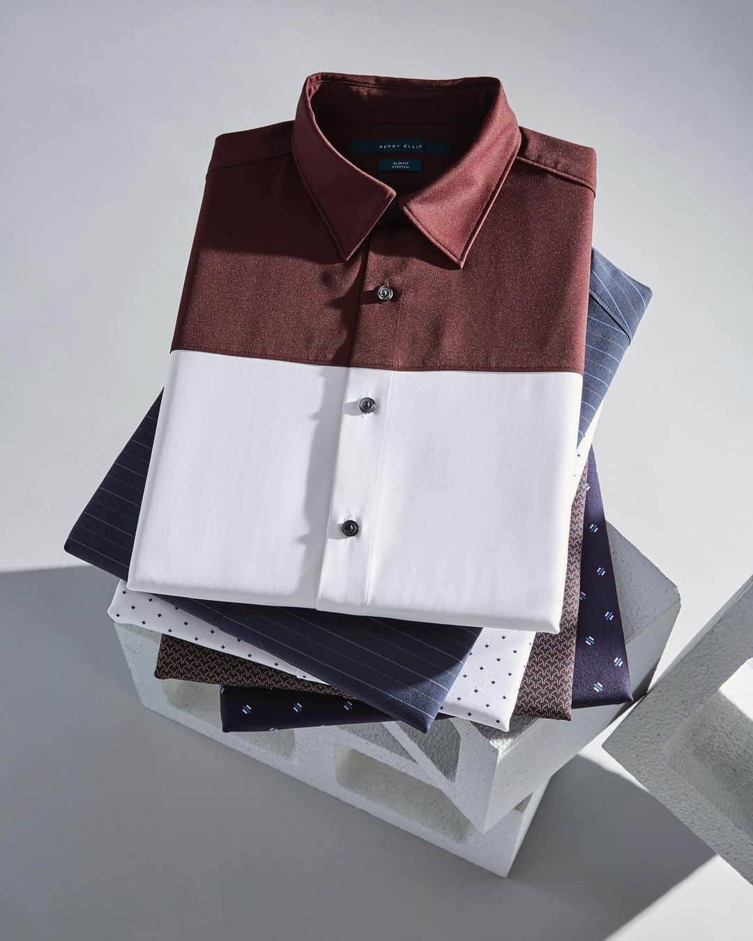 ペリーエリスのインスタグラム：「Sharp style and comfort come together with our collection of Total Stretch shirts. Link in bio. #PerryEllis #LifeReadySince1976」