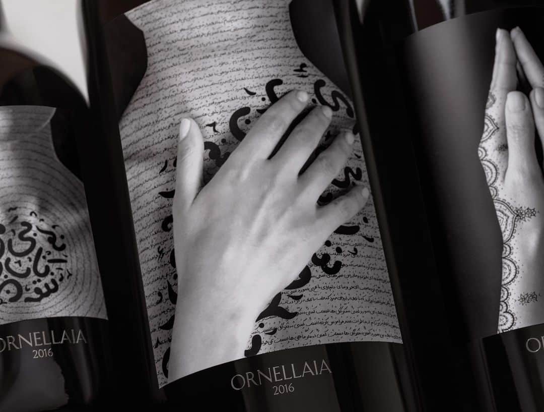 サザビーズさんのインスタグラム写真 - (サザビーズInstagram)「Today in #London bidding opens on Sotheby’s Wine’s online-only sale of limited-edition bottles of Tuscan estate Ornellaia’s 2016 vintage. To celebrate the 11th edition of the Vendemmia d’Artista, @ornellaiawinery invited Shirin Neshat to interpret the character of the estate’s 2016 #wine, “La Tensione” (Tension), and customise a series of 111 large format bottles as well as a special label to be included on one 75cl bottle in each case of the vintage.  The artist’s concept is centered around the theme of wine as a catalyst for social sharing, a life force that should be “enjoyed during our brief time on earth”, in the words of the 11th-century Persian poet Omar Khayyam whose poem is inscribed as calligraphy over the surfaces of female faces, hands and bodies.  Every year since the release of Ornellaia 2006 in 2009, a contemporary artist has created a site-specific work of art and a series of limited-edition labels as part of the Vendemmia d’Artista programme. Earlier this year, Ornellaia announced its support of the Solomon R. Guggenheim Foundation as part of a three year partnership which will see the expansion of the museum’s innovative programme, ‘Mind's Eye’, developed by its education department in 2008 to help individuals who are blind or have low vision experience art through all their senses.  Featuring 9 Imperials (6L) and a unique 1 of 1 Salmanazar (9L), the auction will run until 13 September.  Photographs courtesy of Ornellaia.  #SothebysWine」8月29日 16時58分 - sothebys