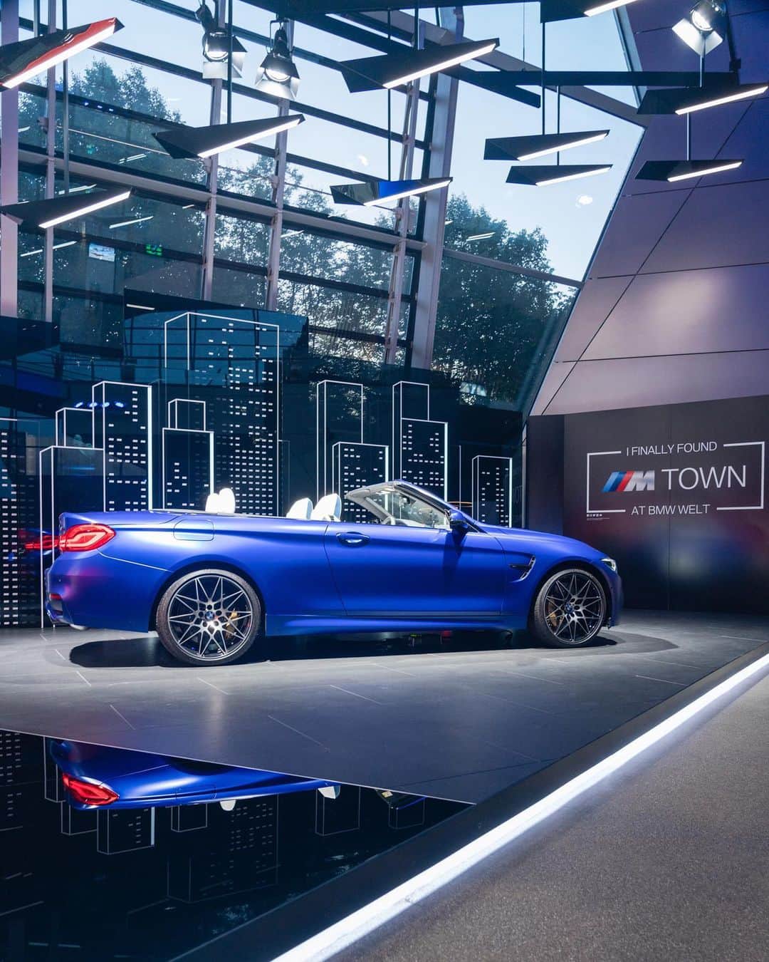 BMWさんのインスタグラム写真 - (BMWInstagram)「The virtual dream city of M Town came to life at BMW Welt. Who's moving in?  #TheX3M #TheX4M #BMW #BMWM #M_Town @bmwwelt __ BMW M5 Competition: Fuel consumption in l/100 km (combined): 10.6. CO2 emissions in g/km (combined): 241.  BMW M4 Convertible: Fuel consumption in l/100 km (combined): 10.2 [9.5]. CO2 emissions in g/km (combined): 232 [217]. BMW X3 M Competition: Fuel consumption in l/100 km (combined): 10.5. CO2 emissions in g/km (combined): 239.  BMW X4 M Competition: Fuel consumption in l/100 km (combined): 10.5. CO2 emissions in g/km (combined): 239.  The values of fuel consumptions, CO2 emissions and energy consumptions shown were determined according to the European Regulation (EC) 715/2007 in the version applicable at the time of type approval. The figures refer to a vehicle with basic configuration in Germany and the range shown considers optional equipment and the different size of wheels and tires available on the selected model. The values of the vehicles are already based on the new WLTP regulation and are translated back into NEDC-equivalent values in order to ensure the comparison between the vehicles. [With respect to these vehicles, for vehicle related taxes or other duties based (at least inter alia) on CO2-emissions the CO2 values may differ to the values stated here.] The CO2 efficiency specifications are determined according to Directive 1999/94/EC and the European Regulation in its current version applicable. The values shown are based on the fuel consumption, CO2 values and energy consumptions according to the NEDC cycle for the classification. Further information on official fuel consumption figures and specific CO2 emission values of new passenger cars is included in the following guideline: 'Leitfaden über den Kraftstoffverbrauch, die CO2-Emissionen und den Stromverbrauch neuer Personenkraftwagen' (Guide to the fuel economy, CO2 emissions and electric power consumption of new passenger cars), which can be obtained free of charge from all dealerships, from Deutsche Automobil Treuhand GmbH (DAT), Hellmuth-Hirth-Str. 1, 73760 Ostfildern-Scharnhausen and at https://www.dat.de/co2/.」8月30日 17時12分 - bmw
