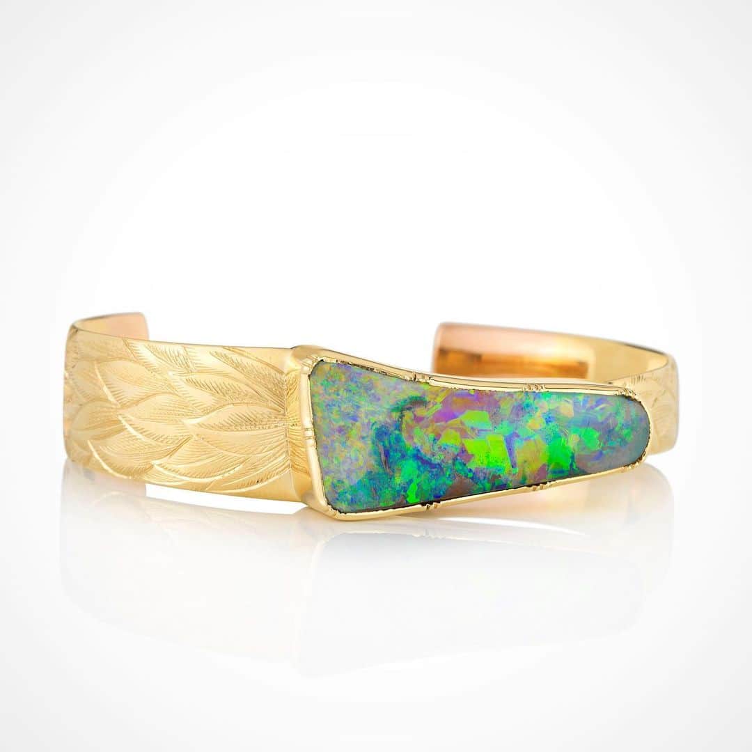 のインスタグラム：「Hand forged to allow a touch of rose gold at the edges, hand engraved so I can dream of this boulder opal transforming into an eagle that can fly 🦅🌈💕✨#handforged #handengraved #boulderopal #uniquegems #brookegregson」