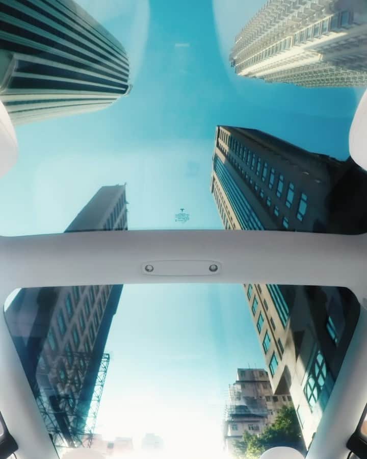 Teslaのインスタグラム：「Hong Kong: Best viewed through a Model 3 glass roof.」