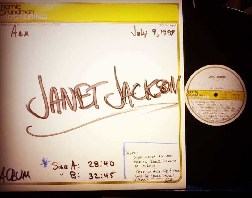 ジミー・ジャムのインスタグラム：「30 years and a week since the release of @janetjackson Rhythm Nation 1814. For #tbt I thought I’d post some pics of the ingredients that went into the “sauce” (keys, synths, drum machines, soundchips, tape machines, tape..etc) as well as the original acetate of the finished album. The volume of the vinyl version was down a couple db’s as noted on the cover because of the limitations of mastering more than 20 mins per side. That has been corrected on the recently released 2 disc vinyl set😎 #janetjackson #jimmyjam #terrylewis #flytetyme #rhythmnation #rn30 #linndrum #sp1200 #oberheim #ensoniq #mirage #dx7 #otari #harrison #mr4 #agfa #series10 #stevehodge #briangardner #berniegrundman」