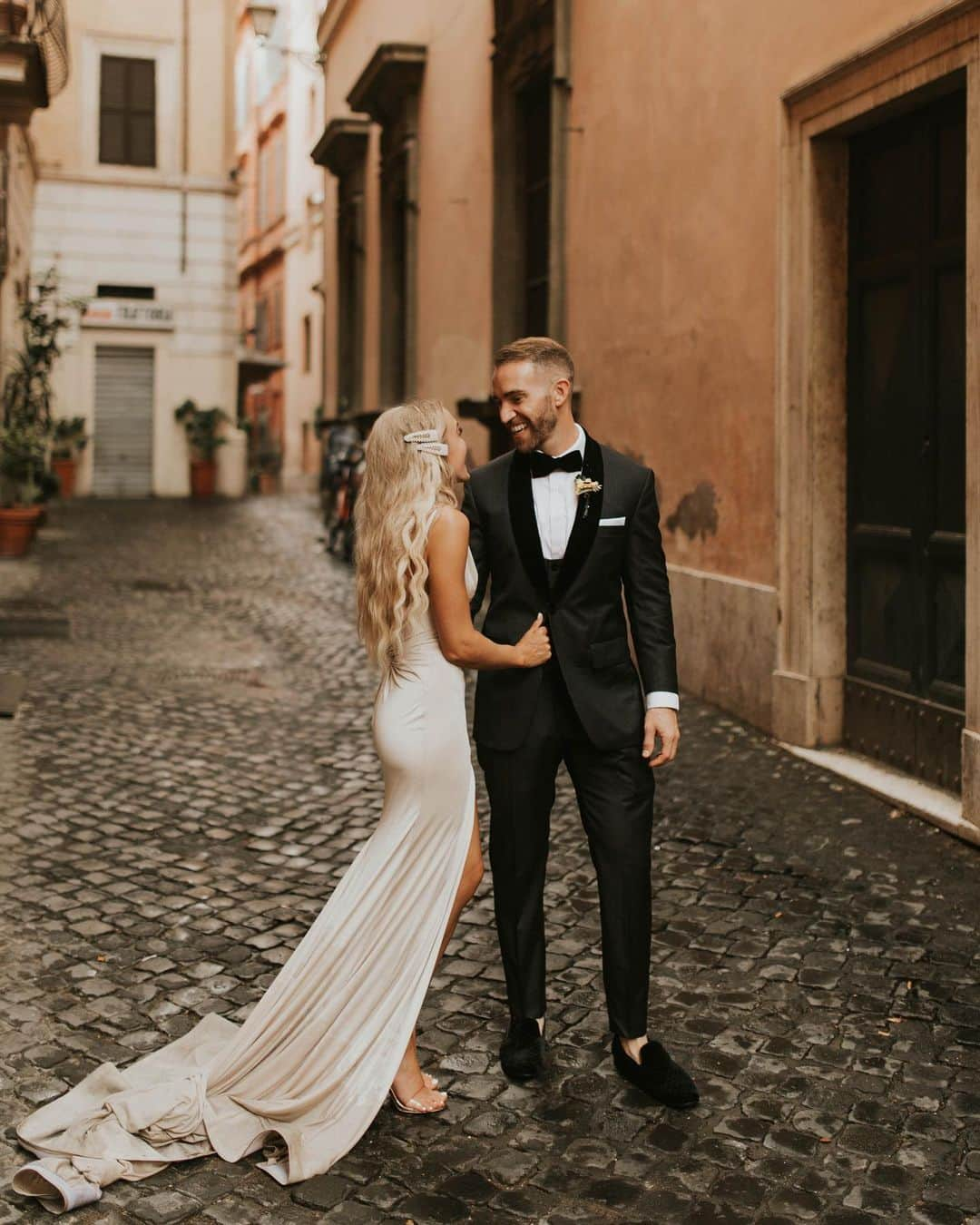 メリッサ・モリナロさんのインスタグラム写真 - (メリッサ・モリナロInstagram)「I remember the 1st time Nick and Ally told me they wanted to get married in front of the Trevi fountain. My 1st thought was you guys are crazy!!! I love it!!! So lit!! My 2nd...how the f$ck!? It’s the biggest tourist attraction in Rome. They had a vision and by the grace of God made it happen. The plan was to meet at the fountain at 7am we had no idea if the police was going to shut us down because they were everywhere! My stomach was in knots! As soon as Ally started to walk it started to rain! And maybe that was God looking out for them because no one was there but our family. A little rain wasn’t going to stop them. It was the craziest most amazing day I’ve ever witnessed. It goes to show you your wedding day can literally be anything you want it to be. This was a dream come true not just for them but all of us who got to witness it. Thank you for bringing us all together as a family making memories that will last a lifetime! I love you both so much! @stephenicholasmith @allysmith93 The most amazing photos captured by my sis @ashabaileyphotography @ashajpg」9月28日 1時09分 - melissamolinaro