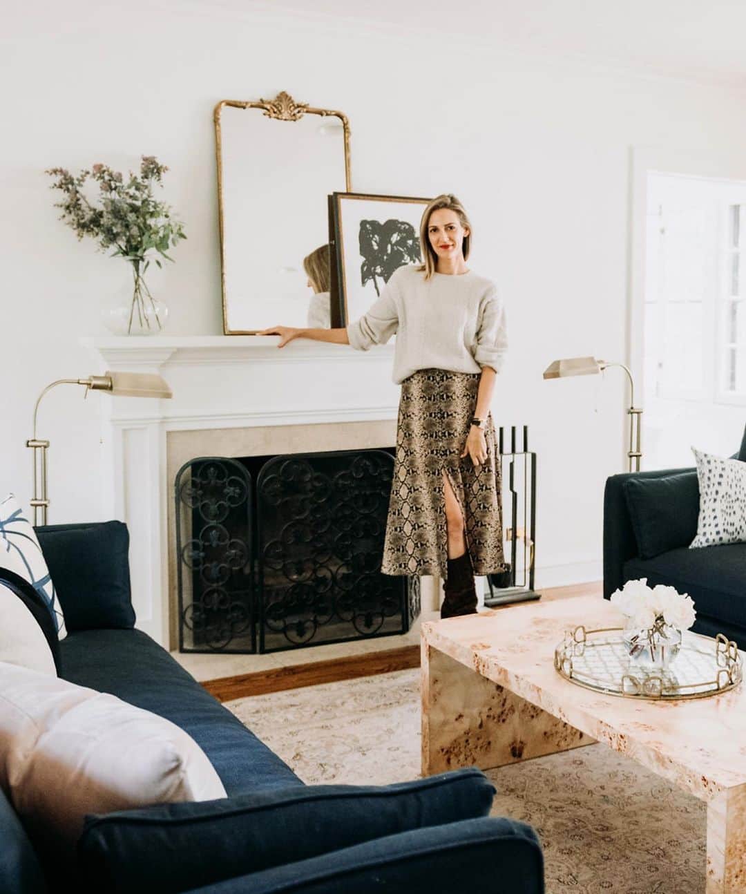 Anna Jane Wisniewskiのインスタグラム：「It’s been a year since this photo was taken and this room looks a bit different—larger mirror over the mantel, photo photos hung (yet still not finished), and most importantly, the drapes are up! It really does take awhile to make a house a home, right!? Also, I said a printed midi or dress (anima print) is a fall must-have and I stand by it! Still love this skirt from last year and I know if you give it a chance, you’ll really sink your teeth into the snakeskin trend (what? Pun intended? Did that make sense?) 🐍  http://liketk.it/2EGs6 #liketkit @liketoknow.it #LTKhome #LTKunder100 #thisoldhouse #thisoldtudor #sodomino」