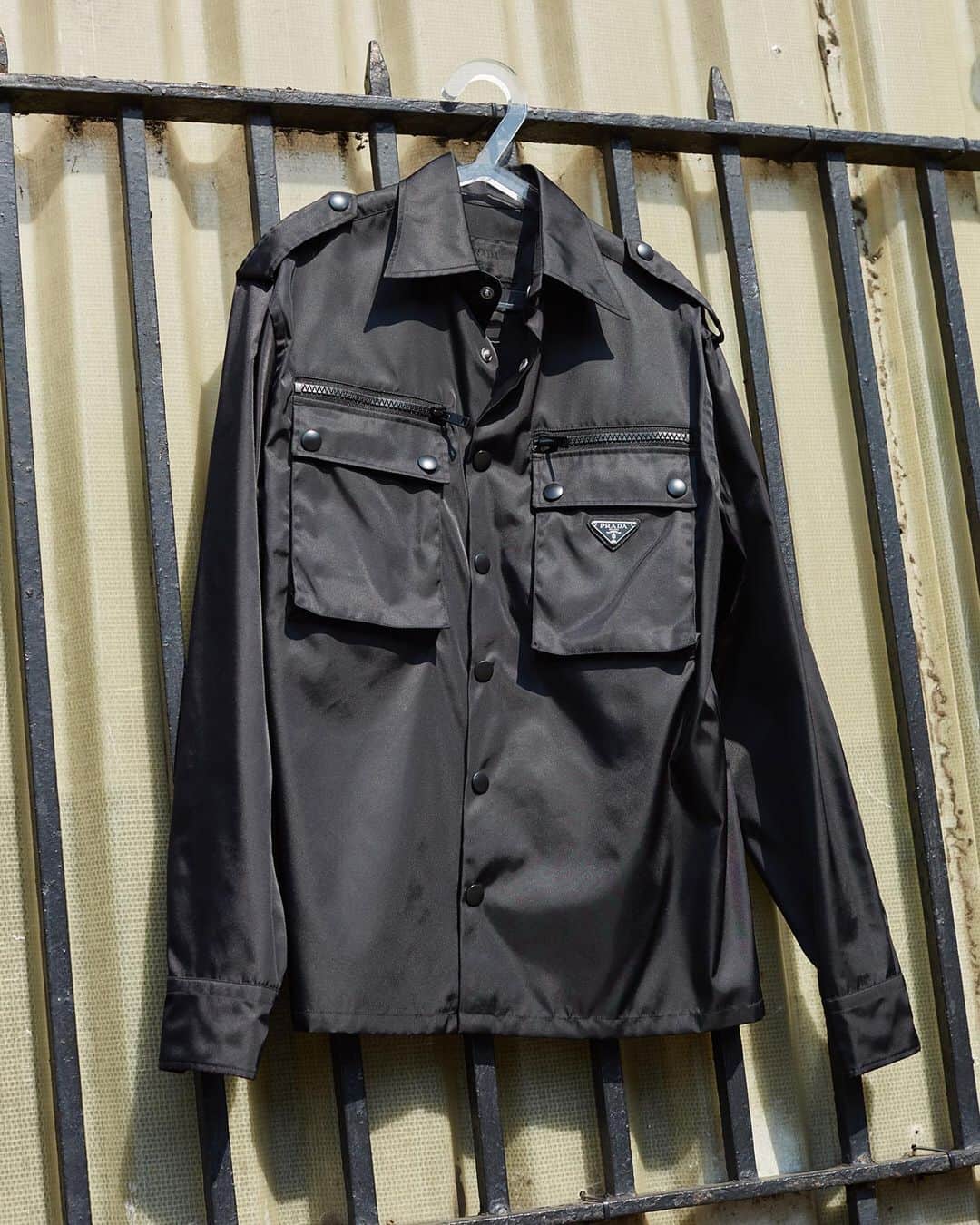 のインスタグラム：「Shop Prada's signature gabardine nylon collection. The Prada Nylon Patch Pocket Shirt is now available in-store and online @thelncc @prada #pradashoes」