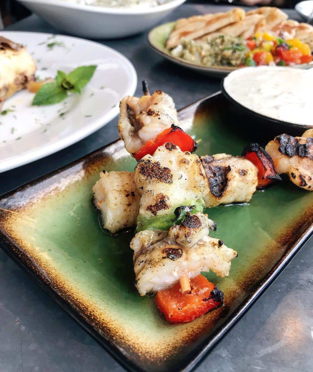Eat With Steph & Coのインスタグラム：「Pescatarian alert ‼️ Aegean kitchen launched as part of @therealgreekuk’s new concept. Lots of seafood on offer. Loveeed this super tender monkfish, the classic hummus, and octopus salad.  The flagship store has amazing riverside views too, so make the last of the last of the summer days 💯 #invite #greekfood #aegean #seafood #healthy #healthydinner #hummus #mediterraneandiet #londonist #timeoutlondon」