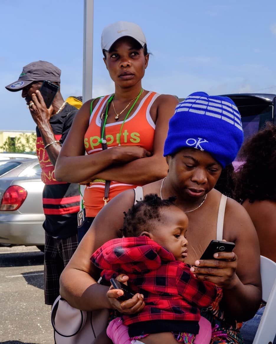 Wall Street Journalさんのインスタグラム写真 - (Wall Street JournalInstagram)「Family members of those still stranded in the Bahamas’ devastated Abaco Islands waited at a private airfield in Nassau Thursday hoping their loved ones would emerge from one of the chartered planes that began arriving with survivors.⠀ ⠀ Joann Augustin (left), Bernadette Ruben (right) and her one-year-old-daughter, Angelica, were among those waiting to hear back about search and rescue efforts, after #HurricaneDorian unleashed Category 5 winds that razed communities and left dozens dead.⠀ ⠀ Read more at the link in our bio.⠀ ⠀ 📷: Christopher Lee for @wsjphotos」9月7日 6時55分 - wsj