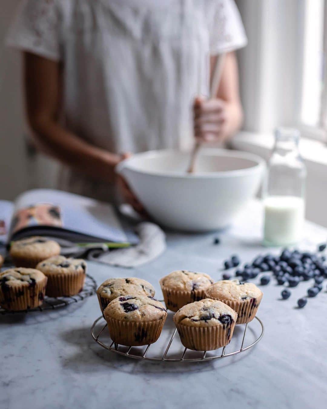 Krissyのインスタグラム：「made up batches of @edibleliving blueberry muffins yesterday (recipe from her new book Every Day is Saturday) . using our summer stores of blueberries pulled from the freezer, warming the kitchen, windows open to the autumnal breezes . then wrapping them carefully in parchment and trundling babé and muffins off to his grandparents while the Mr and I make for the Berkshires- celebrating 6 years of marriage ✨ . . . . #everydayissaturdaycookbook #weekendfood #mynewengland #eleganceintheeveryday #myeverydaymagic #simplejoys #embracingtheseasons #thebakefeed #poetryofsimplethings #farmtotable #madefromscratch #makeitdelicious #flashesofdelight #rslove #eattheworld #onmytable #momentsofmine #cakesofinstagram」