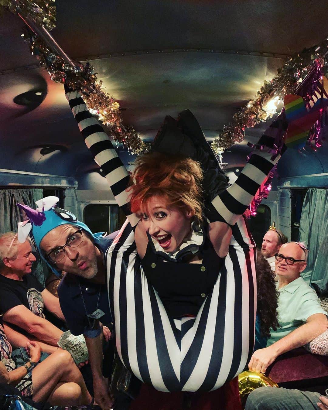 ボニー・モーガンのインスタグラム：「On the party bus celebrating the most Epic Glorious Birthday of the one and only @dandasmann! Thank you to his magnificent wife @lindsaybenner for this wild adventurous ride! #adventuresofbendybonnie #happybirthdaydan #shenanigans #contortionmischief #partybus #circusfolk #hangingaround #dandasmann #clowningaround #stripes #mypeople #bendybonnie」