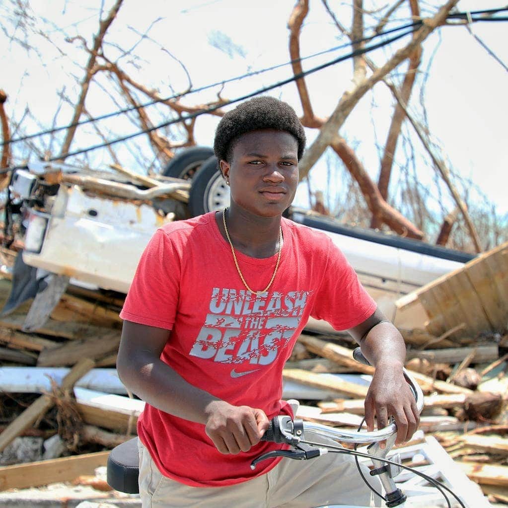 unicefさんのインスタグラム写真 - (unicefInstagram)「Benson Etienne, 15, was with his family in a two-story building when Hurricane Dorian slammed Abaco Island for 40 hours. The roof was the first thing to disappear, leaving the family of 8 out in the open with strong winds and rain. “We had to swim for our lives in dirty water, fighting against strong currents. Now everything is destroyed, every school. There is no water to drink,” Benson says.  On 7 September, a plane arrived to the Bahamas carrying nearly 1.5 tons of lifesaving supplies that will help provide access to safe water for over 9,500 children and families left reeling by Hurricane Dorian. In support of the Government and UN partner agencies, UNICEF is working around the clock to start the distribution of lifesaving supplies to families in need. © UNICEF/UN0341849/Moreno Gonzalez」9月9日 12時51分 - unicef