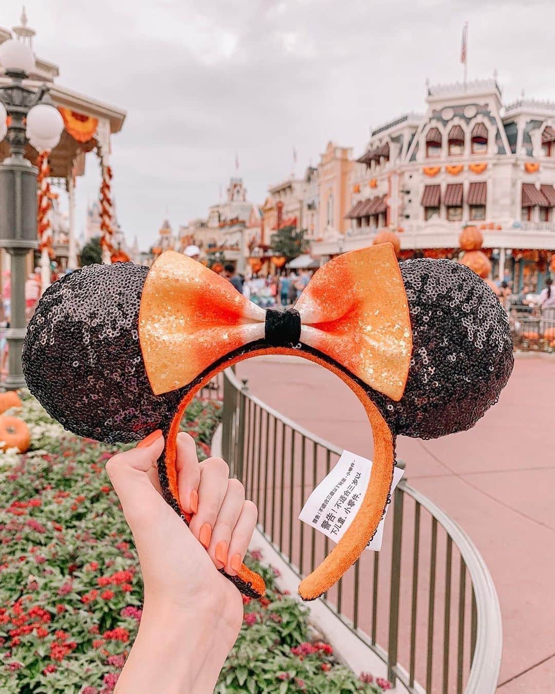 Walt Disney Worldのインスタグラム：「These new candy corn-inspired ears sure are sweet! 😍✨🎃 #DisneyStyle #WaltDisneyWorld (📷: @mickeyspremium)」