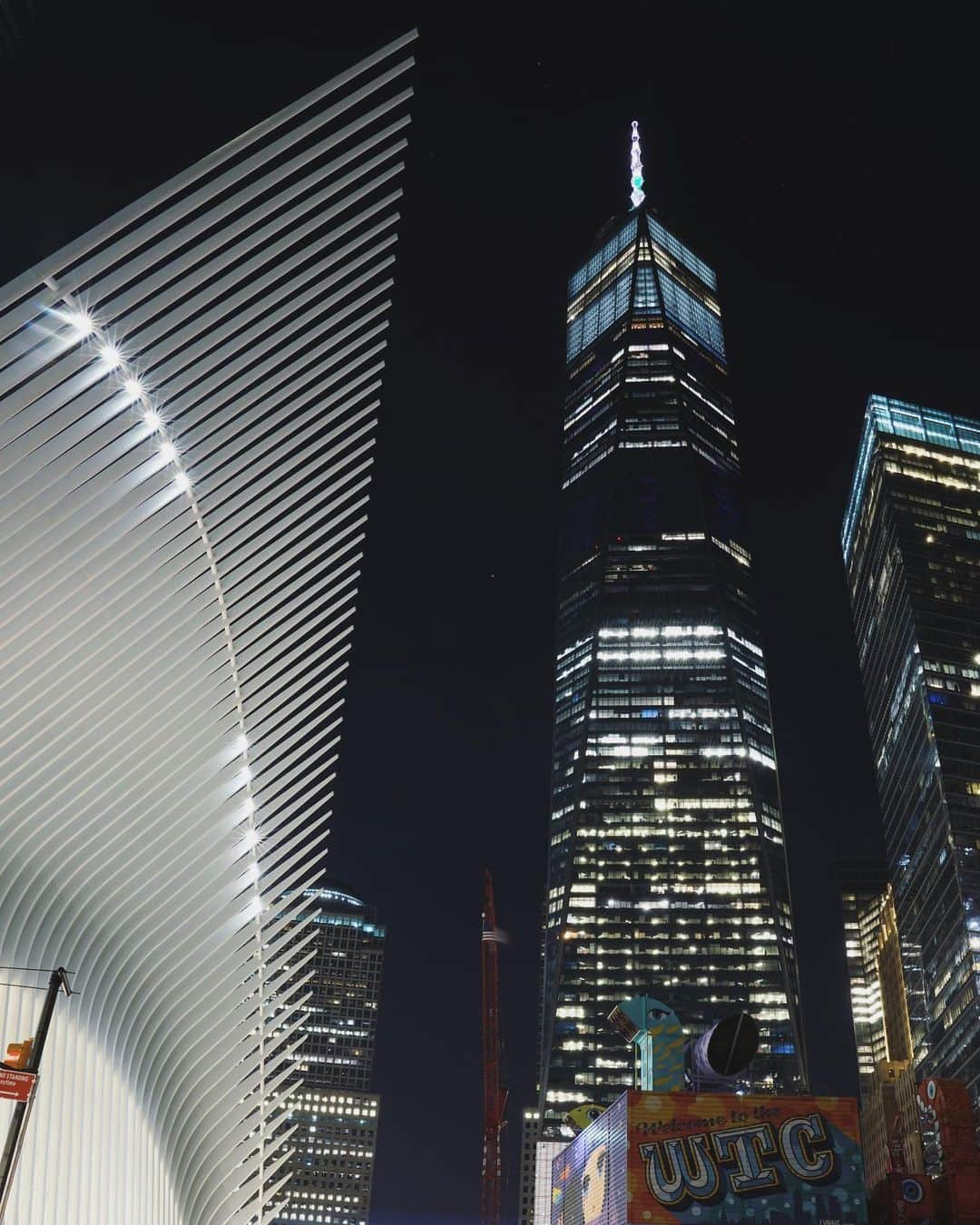 New Yorkのインスタグラム：「City Nights. A quiet stroll around the WTC earlier tonight.」