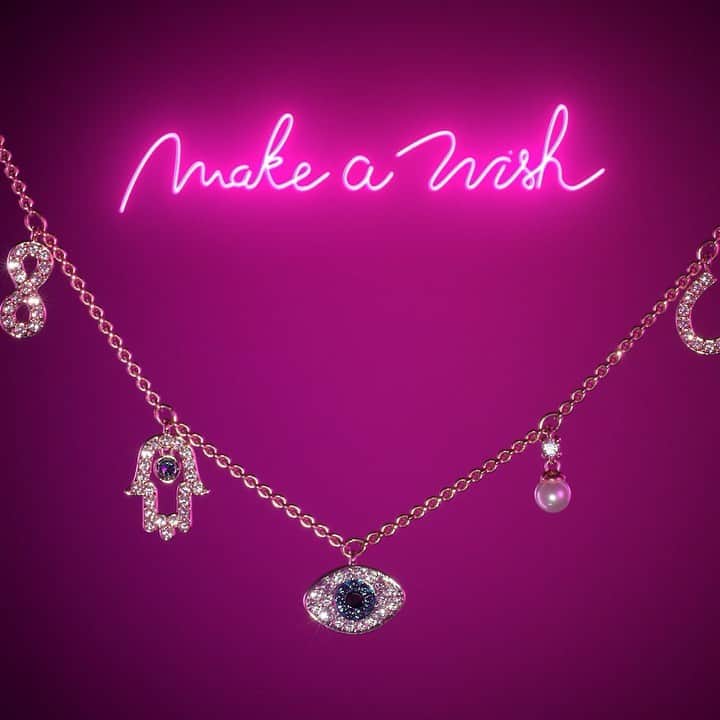 のインスタグラム：「Dream it. Wish it. Wear it. Tell us how you would style the new Swarovski Symbolic Necklace embellished by a lucky horseshoe, an infinity sign, a hamsa hand and an evil eye. #TarotMagic #SparkDelight #SwarovskiNecklace」