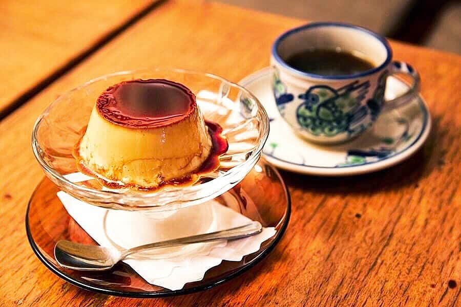 レッツエンジョイ東京さんのインスタグラム写真 - (レッツエンジョイ東京Instagram)「.﻿ ✩★------------------﻿ ノスタルジックさ満点！﻿ レトロな雰囲気が居心地の良い老舗喫茶﻿ ------------------✩★﻿ ﻿ 昭和53年の創業以来、約40年の歴史を誇る「七つ森」🌳﻿ 昔ながらのクラシカルな「カスタードプリン」は自家製😋❣️﻿ ﻿ やや固めの食感がたまりません✨﻿ 卵の風味が豊かな濃厚な味わいで、食べごたえのあるデザートです😍💫﻿ ﻿ 甘いデザートと香り高いコーヒーを楽しみながら、ゆったり過ごす・・・﻿ そんな贅沢な時間で日々の疲れを癒やしてみては☺️？﻿ ﻿ 🍮：七つ森﻿ 📍：新高円寺﻿ 詳細はアカウントトップから﻿ 👉@lets_enjoytokyo﻿ ﻿ #レッツエンジョイ東京 #ぐるなび﻿ #おでかけ #トキメキ女子﻿ #七つ森 ﻿ #プリン #プリン🍮 #pudding ﻿ #プリン部 #プリ活﻿ #プリン好き #プリン大好き﻿ #甘党 #スイーツ好き﻿ #スイーツ好きな人と繋がりたい﻿ #スイーツ巡り #スイーツ女子﻿ #純喫茶 #純喫茶巡り #喫茶店巡り﻿ #喫茶店 #喫茶店巡り ﻿ #甘いもの大好き #カフェ部 ﻿ #カフェ巡り #東京カフェ ﻿ #高円寺カフェ #高円寺グルメ﻿ #高円寺 #新高円寺」9月12日 17時30分 - lets_enjoytokyo