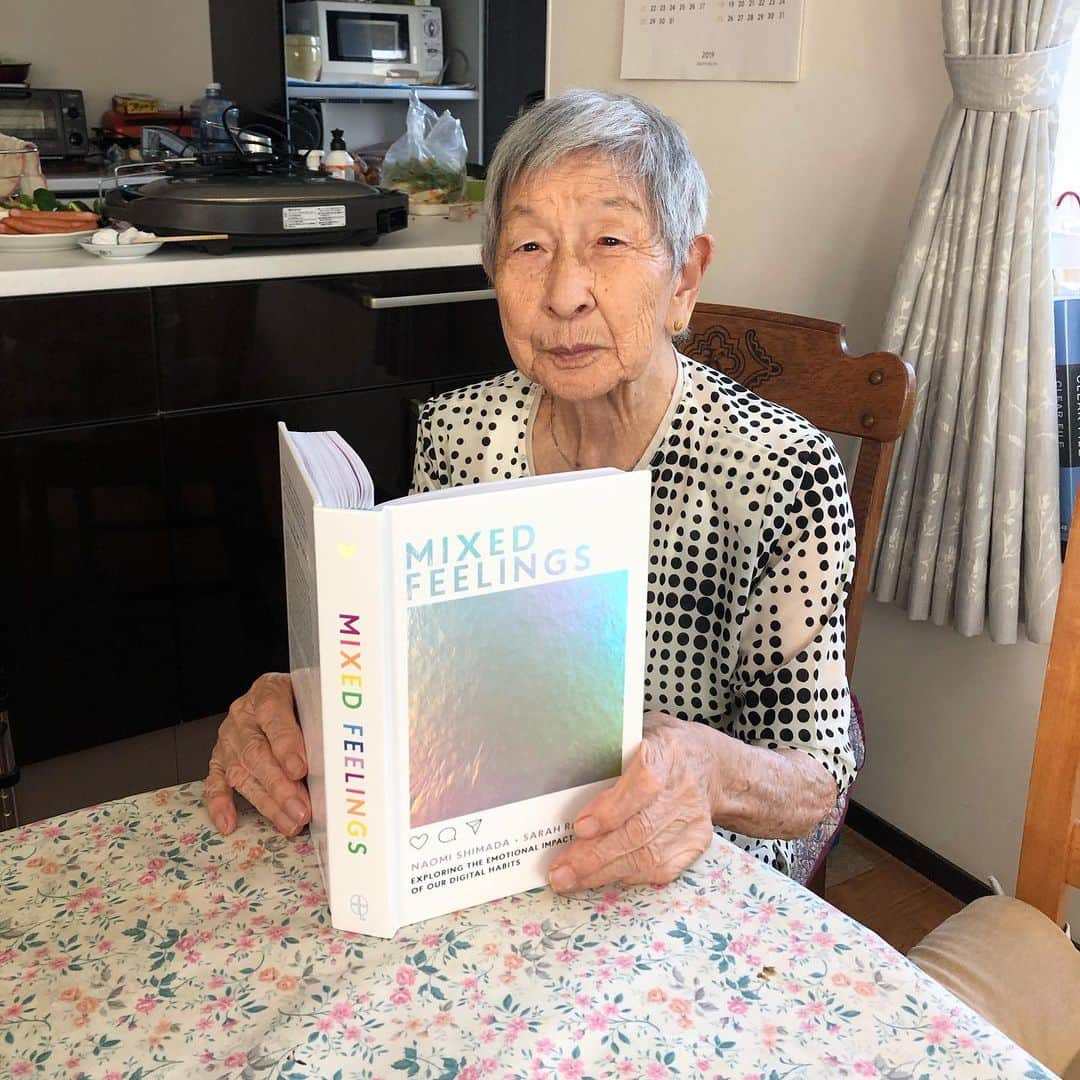 ナオミ・シマダのインスタグラム：「my very fab grandmother fumiko was born in 1920 which makes her a ripe ol' casual 98 years old! I tried to explain the subject matter of the book to her, her reply was ‘social media sounds scary’. there’s definitely truth in that, that’s why we decided to write this book in the first place and we went deep into our exploration through writing about our own experiences (as well as essays, interviews and q&a’s from an amazing spectrum of humans!) of how this technology has affected our work lives, how we love, how we spend our ‘free time’, our friendships, how we think about beauty/our bodies and so much more. we wrote it to help people feel less alone in the experiences that we have in isolation, alone on our phones. so on that note, our book comes out A WEEK TODAY! and if you want to find out whether our book is REALLY big or my grandma is REALLY small - preorder your copy through the link in bio so you can hold it yourself to check 😉💕」