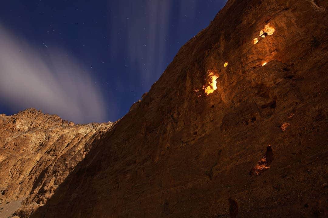 Cory Richardsさんのインスタグラム写真 - (Cory RichardsInstagram)「Some recent conversations have brought my memories to float back in time to my first story for #NatGeo.  The “Sky Caves of Mustang” are a large collection of 10,000 or more man-made caves dug into the sides of a valley in northern #Nepal. Archeologists and researchers have explored a fraction of these caves and have found mummified human remains dating to at least 2,000-3,000 years old. . As the world becomes smaller, exploration and discovery shifts and changes in meaning as well. Archeologists on our expedition required the support of climbers, like myself and @mattsegal, to access these caves. Just as the printing press changed history, advent of digital dissemination of not just the written word, but visual stories have altered the way we connect, research, explore and communicate.  How do you feel discovery, exploration and science has changed through new world of Instagram? . Pictured here: a cave illuminated with researchers' lamps while exploring the sky caves of Mustang. #mustang #exploration #discovery #adventure」9月13日 0時02分 - coryrichards