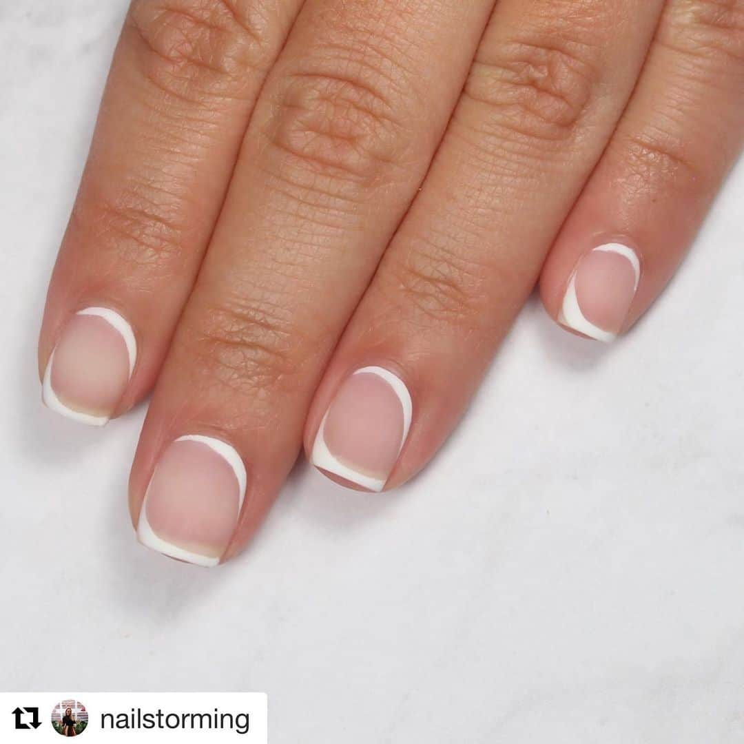 Nail Designsさんのインスタグラム写真 - (Nail DesignsInstagram)「Credit @nailstorming ・・・ Next up from my @essie NYFW recreations is the perfect combination of edgy and feminine for the second look from KITH! Lead artist @betina_goldstein took a twist on the traditional french by mirroring it with a double corner and finishing it off with a matte topper. ✨ - Products used: All @essie polishes  Base: “Here To Stay” Sheer base: “Mademoiselle” White: “Blanc”  Top Coat: “Matte About You” #essieNYFW #essielove #essiepartner」9月14日 6時30分 - nailartfeature