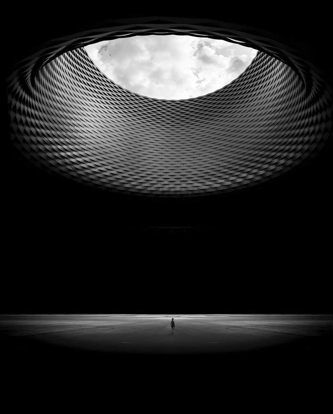 のインスタグラム：「"I love the range of shooting with the Leica SL. For this shot I was able to under expose the shadows and still keep the highlights of the scene. The ultra wide on the 16-35mm really shows the scale of the place." Shooting with the Leica SL and a Super-Vario-Elmar-SL 1:3.5-4.5/16-35 ASPH., Jason Peterson (@jasonmpeterson) captures this stunning scene at the Messe in Basel, Switzerland. Discover the Leica SL for yourself via the bio link.  #LeicaCamera #Leica #🔴📷 #Leicagram #LeicaSL #LeicaMonochrome #TheLeicaLook #LeicaWorld #Leica_Club #LeicaSociety #LeicaPhoto #ShootLeicaPro #streetphoto #bnw_world #bnwmood #bnwlovers #bnwstreet #photocinematica #archilover #architecturephotography #bnw_society #basel」