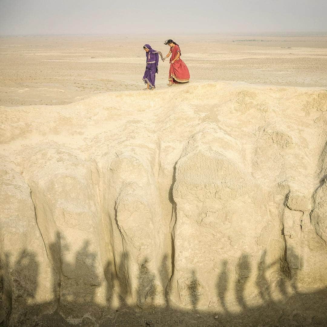 Instagramさんのインスタグラム写真 - (InstagramInstagram)「#HelloFrom Balochistan, Pakistan. “Surrounded by a desert, hiking up to the edge of a dormant mud volcano is guaranteed to be special,” says photographer Matthieu Paley (@paleyphoto), who captured this mother and daughter holding hands at the crater’s edge. ⁣ ⁣ Photo by @paleyphoto」9月16日 3時11分 - instagram