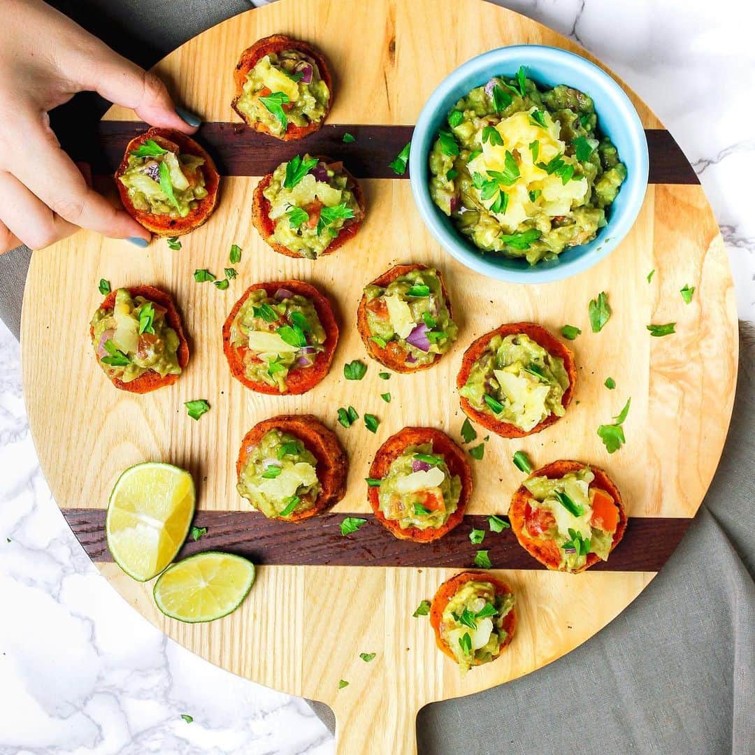 Dole Packaged Foods（ドール）のインスタグラム：「Bites of roasted sweet potato topped with seasoned, pineapple guacamole is just the recipe #NationalGuacamoleDay needed. Try these for an easy-to-make gluten free option at your next get together 🥑」
