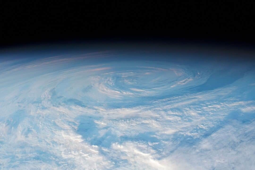 NASAさんのインスタグラム写真 - (NASAInstagram)「Cloud formations over the Pacific! ⁣⁣☁️☁️☁️ ⁣⁣ An astronaut on the @ISS took this photo on April 4, 2019, while the station was traveling near the southernmost reaches of its orbit over the South Pacific Ocean. The striking colors within the cloud formation are a result of the local sunrise. When the Sun is at a low angle (relative to the atmosphere and the space station), sunlight passes through a thicker slice of the atmosphere. This can enhance the red end of the visible color spectrum, leading to the pink hues visible at the center of the image. ⁣⁣ ⁣⁣ The astronaut who took this photograph sent a message to ask if this specific cloud formation had been a named tropical cyclone. However, because the weather system was short-lived, the storm dissipated before making landfall, and thus was not named. ⁣⁣ ⁣ Image Credit: NASA⁣ ⁣⁣ #clouds #spacestation #weather #nasa #astronautphotographs #cloudformations」9月17日 6時36分 - nasa