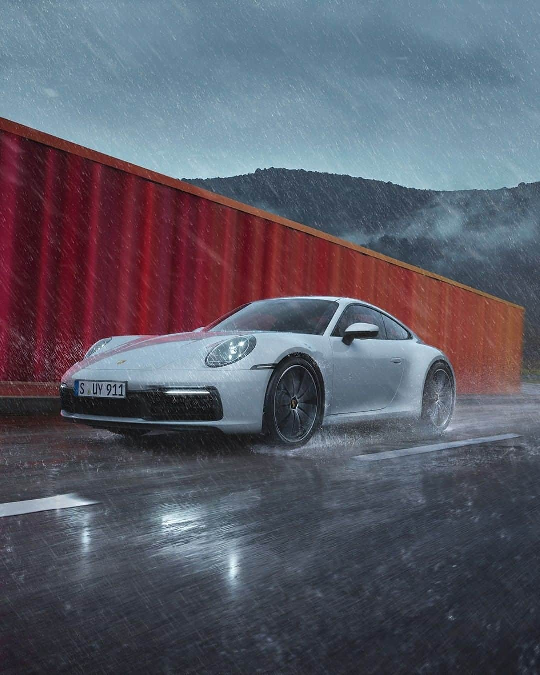 Porscheさんのインスタグラム写真 - (PorscheInstagram)「Rain, hail or shine, the brand new 911 Carrera 4 has got you covered. These two all-wheel-drive models, a Coupé and Cabriolet, share the same striking design cues and performance as the rest of the model range. In fact, they even boast 15 PS more than the previous 911 Carrera 4 models.  #Porsche #911 #Carrera4  _ Combined fuel consumption in accordance with EU 6: 911 Carrera 4 models: 9,2 l/100 km, CO2 emissions: 211-210 g/km」9月20日 23時31分 - porsche