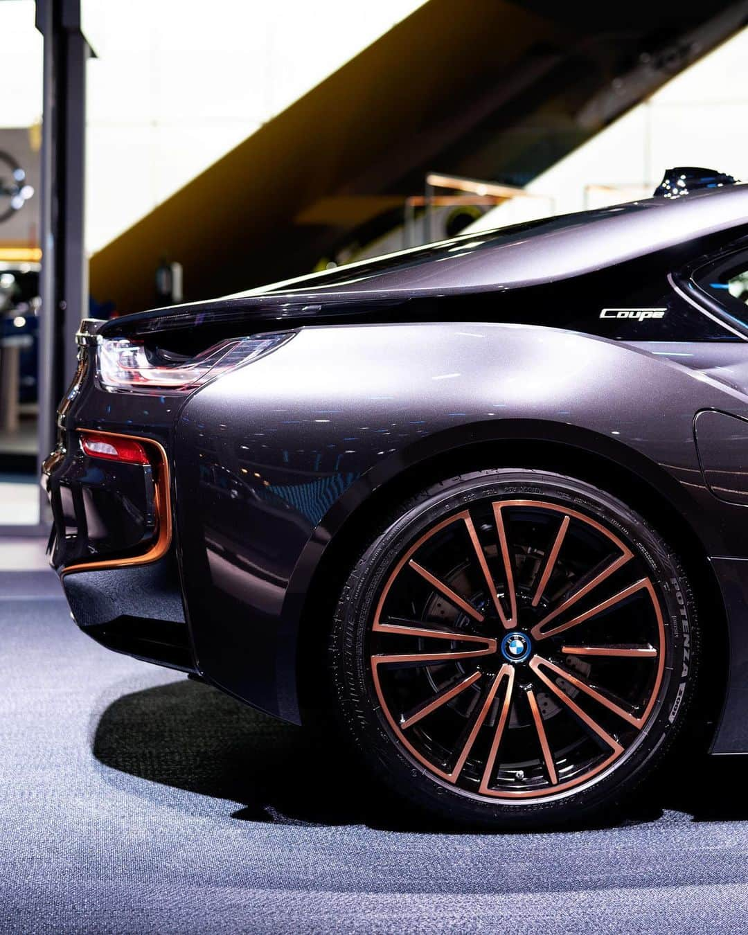 BMWさんのインスタグラム写真 - (BMWInstagram)「Exclusive touches raise sporting presence to a new level.  Meet the BMW i8 Coupé Ultimate Sophisto Edition at #IAA19 in Frankfurt. #THEi8 #BMW #BMWi8 #BMWIAA @BMWi @BMWdeutschland __ BMW i8 Coupé: Energy consumption in kWh/100 km (combined): 14.0. Fuel consumption in l/100 km (combined): 1.8. CO2 emissions in g/km (combined): 42.  Acceleration (0-100 km/h): 4.4 s. Power: 275 kW, 374 hp, 570 Nm. Top speed (limited): 250 km/h. Paint finish shown: Sophisto Grey Brilliant Effect with highlight E-Copper.  The values of fuel consumptions, CO2 emissions and energy consumptions shown were determined according to the European Regulation (EC) 715/2007 in the version applicable at the time of type approval. The figures refer to a vehicle with basic configuration in Germany and the range shown considers optional equipment and the different size of wheels and tires available on the selected model. The values of the vehicles are already based on the new WLTP regulation and are translated back into NEDC-equivalent values in order to ensure the comparison between the vehicles. [With respect to these vehicles, for vehicle related taxes or other duties based (at least inter alia) on CO2-emissions the CO2 values may differ to the values stated here.] The CO2 efficiency specifications are determined according to Directive 1999/94/EC and the European Regulation in its current version applicable. The values shown are based on the fuel consumption, CO2 values and energy consumptions according to the NEDC cycle for the classification. Further information on official fuel consumption figures and specific CO2 emission values of new passenger cars is included in the following guideline: 'Leitfaden über den Kraftstoffverbrauch, die CO2-Emissionen und den Stromverbrauch neuer Personenkraftwagen' (Guide to the fuel economy, CO2 emissions and electric power consumption of new passenger cars), which can be obtained free of charge from all dealerships, from Deutsche Automobil Treuhand GmbH (DAT), Hellmuth-Hirth-Str. 1, 73760 Ostfildern-Scharnhausen and at https://www.dat.de/co2/.」9月21日 0時01分 - bmw