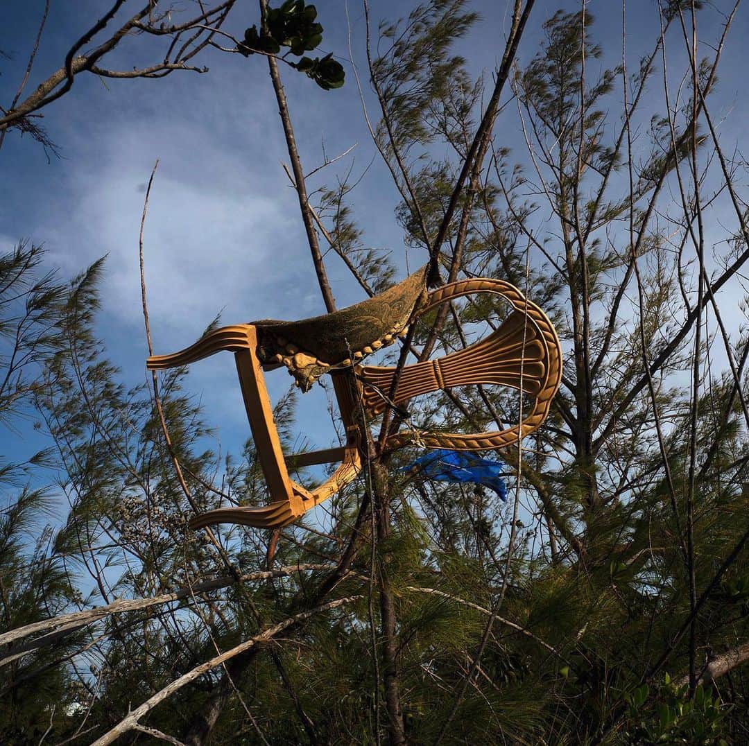 TIME Magazineさんのインスタグラム写真 - (TIME MagazineInstagram)「Ramón Espinosa is no stranger to hurricanes. The Associated Press photographer, based in Cuba, has covered storms in the #Caribbean for the past 14 years, he says, "but nothing compared to this one." Hurricane Dorian hit the #Bahamas as a Category 5 storm with 185 mph winds, becoming the strongest on record to strike the islands. Dorian's death toll currently stands at 50, but more than 1,000 people are still missing. "It was giant, weird, stationary and crushing everything," says Espinosa. In the days afterward, his images of dramatic rescues felt startling and immediate—the closest thing to being there, writes @paulmoakley. More recently, he was able to travel to the areas most deeply affected, producing images that show the epic destruction yet feel like a lament to what was lost. In these photographs, a chair is caught in a tree; Tereha Davis eats rice among the scattered remains of her home;  and cars are stranded on a damaged road. Read the full interview, and see more pictures, at the link in bio. Photographs by @aprespinosa—@apnews」9月22日 6時59分 - time