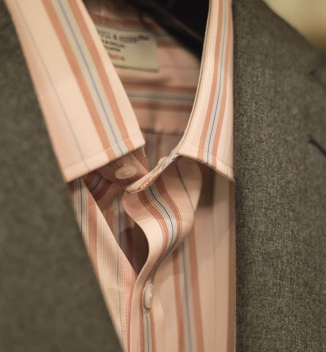 ターンブル&アッサーさんのインスタグラム写真 - (ターンブル&アッサーInstagram)「In an intricate mixed stripe pattern exclusive to us, this shirt’s updated seasonal colour palette of pink, blue and grey means it will stand out without the need of a tie. As the work place uniform begins to relax, it’s the perfect choice when paired with a timeless grey suit. #turnbullandasser #turnbull_asser #shirtmaker #jermynstreet #menswear #fashion #newyork #craftsmanship #london #royalwarrant #giftsforhim #heritagebrand #britishheritage」9月23日 1時01分 - turnbull_asser