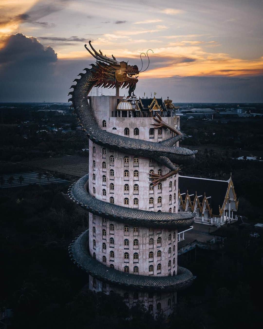 Instagramさんのインスタグラム写真 - (InstagramInstagram)「⁣⁣ #HelloFrom Wat Samphran, a temple in Nakhon Pathom, Thailand. 🦎 “The dragon has always been one of my favorite mythological creatures and seeing one being wrapped around a building/temple like this makes this place seem like something out of fantasy,” says photographer Nathan Ackley (@nathan_ackley).⁣⁣ ⁣⁣ Say #HelloFrom your part of the world. ❤️ Please submit your own photos and videos to the project using the #HelloFrom hashtag. Any tagged visual shared with the hashtag is eligible for the project and, if selected, to be featured.⁣⁣⁣ ⁣⁣ ⁣⁣ Photo by @nathan_ackley」9月23日 1時39分 - instagram