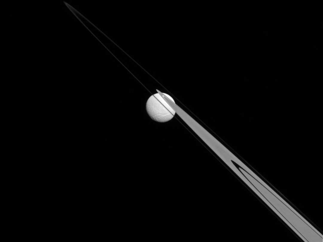 NASAさんのインスタグラム写真 - (NASAInstagram)「Stuck on the rings 💍💍💍 From this perspective, icy moon Tethys appears to be stuck to the A and F rings of planet Saturn! This view from our Cassini spacecraft's narrow-angle camera, taken on July 14, 2014, looks toward the Saturn-facing hemisphere of Tethys. North on Tethys is up and rotated 43 degrees to the right. ⁣ ⁣ Cassini launched in 1997 from Cape Canaveral Air Force Station in Florida and arrived at Saturn in 2004. NASA extended its mission twice – first for two years, and then for seven more. The second mission extension provided dozens of flybys of the planet's icy moons. Cassini explored the Saturn system for 13 years, finishing with "Grand Finale" dives between Saturn and its rings. The mission ended on Sept. 15, 2017.⁣ ⁣ Image credit: NASA/JPL-Caltech/Space Science Institute⁣ ⁣ #tethys #moons #rings #saturn #cassini #solarsystem」9月25日 6時30分 - nasa