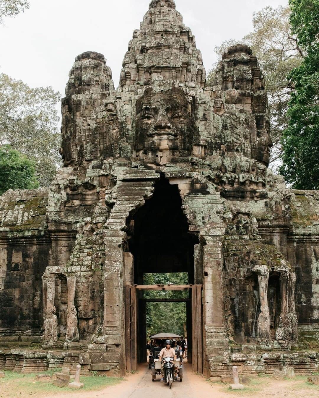 National Geographic Travelさんのインスタグラム写真 - (National Geographic TravelInstagram)「Photo by @kevinfaingnaert | Entering Cambodia’s Angkor Archaeological Park through the monumental south gate is an unforgettable way to start your day. The south gate is the most famous city gate and a kind of emblem of Angkor. Every visitor of Angkor will see it, as the only road from Angkor Wat to Bayon crosses this gate. #cambodia #angkorwat」10月23日 13時09分 - natgeotravel