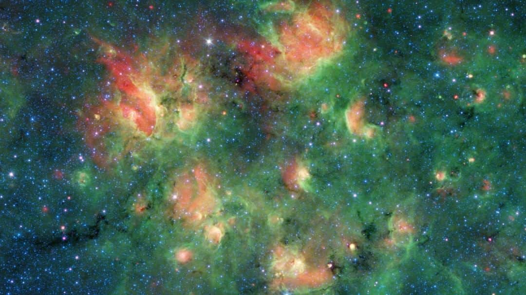 NASAさんのインスタグラム写真 - (NASAInstagram)「Cosmic bubbles in the Milky Way! 🌌 ⁣ ⁣ This Spitzer Space Telescope image shows a cloud of dust and gas filled with bubbles 10 to 30 light-years across, each containing hundreds of thousands of stars. ⁣ ⁣ This active region of star formation is located within the Milky Way galaxy, in the constellation Aquila (also known as the Eagle). Black veins running throughout the cloud are regions of especially dense cold dust and gas where even more new stars are likely to form.⁣ ⁣ The colors in this image represent different wavelengths of infrared light. Blue represents a wavelength of light primarily emitted by stars; dust and organic molecules called hydrocarbons appear green, and warm dust that's been heated by stars appears red.⁣ ⁣ Image Credit: NASA/JPL-Caltech⁣ ⁣ #cosmos #milkyway #nebula #infrared #nasa #starformation」10月1日 6時13分 - nasa